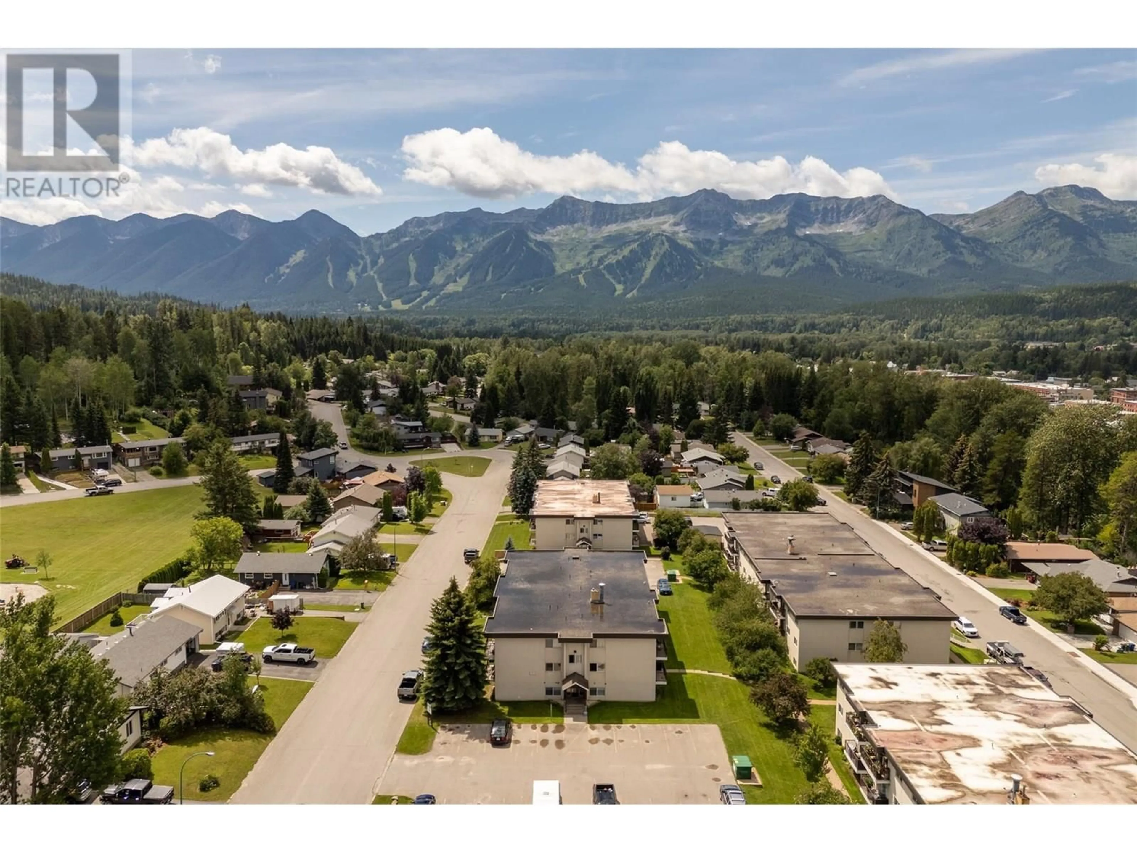 A pic from outside/outdoor area/front of a property/back of a property/a pic from drone, mountain view for 306 - 51 RIDGEMONT DRIVE, Fernie British Columbia V0B1M2