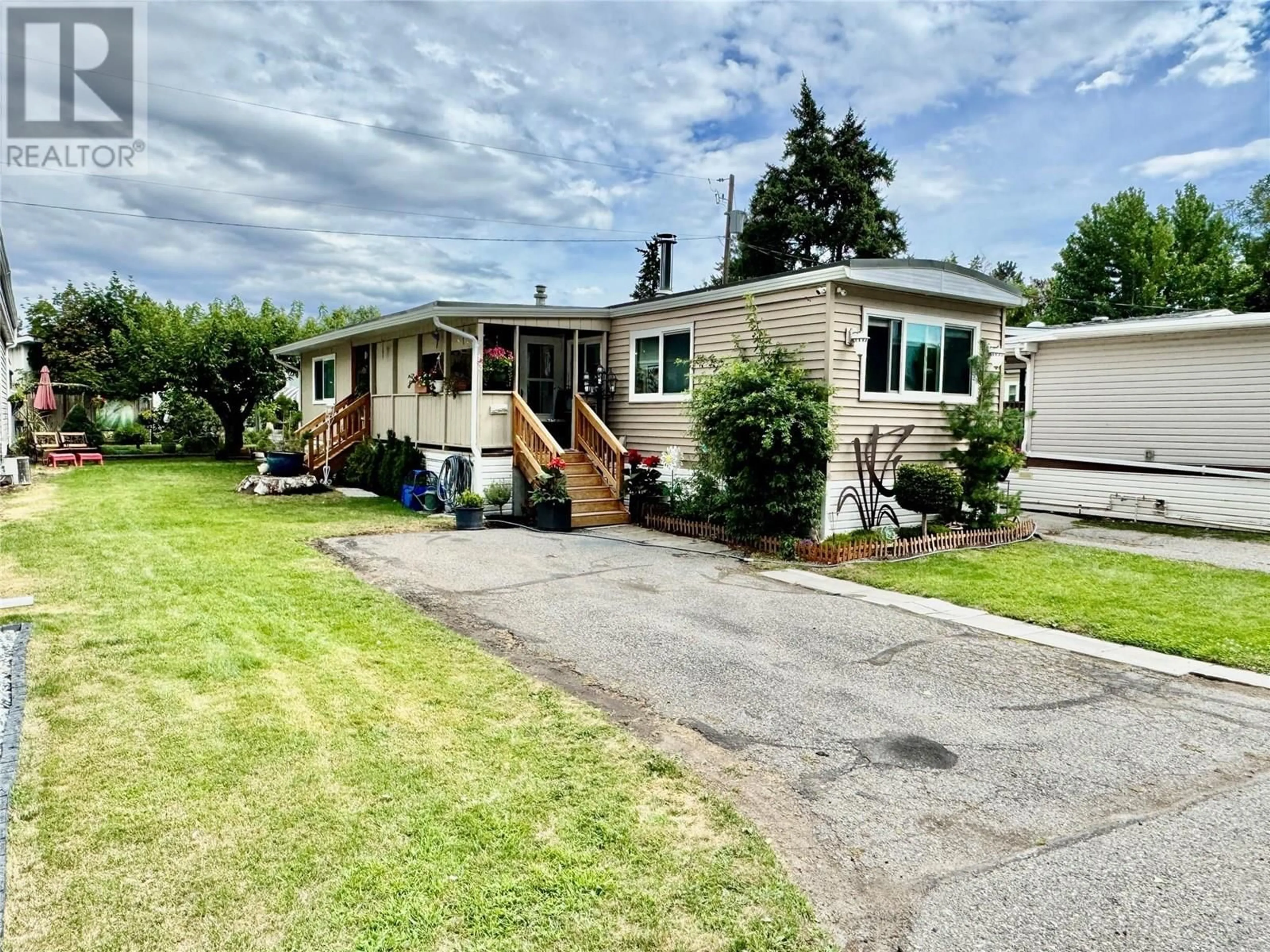 A pic from outside/outdoor area/front of a property/back of a property/a pic from drone, street for 13 - 2095 BOUCHERIE ROAD, Westbank British Columbia V4T1Z4