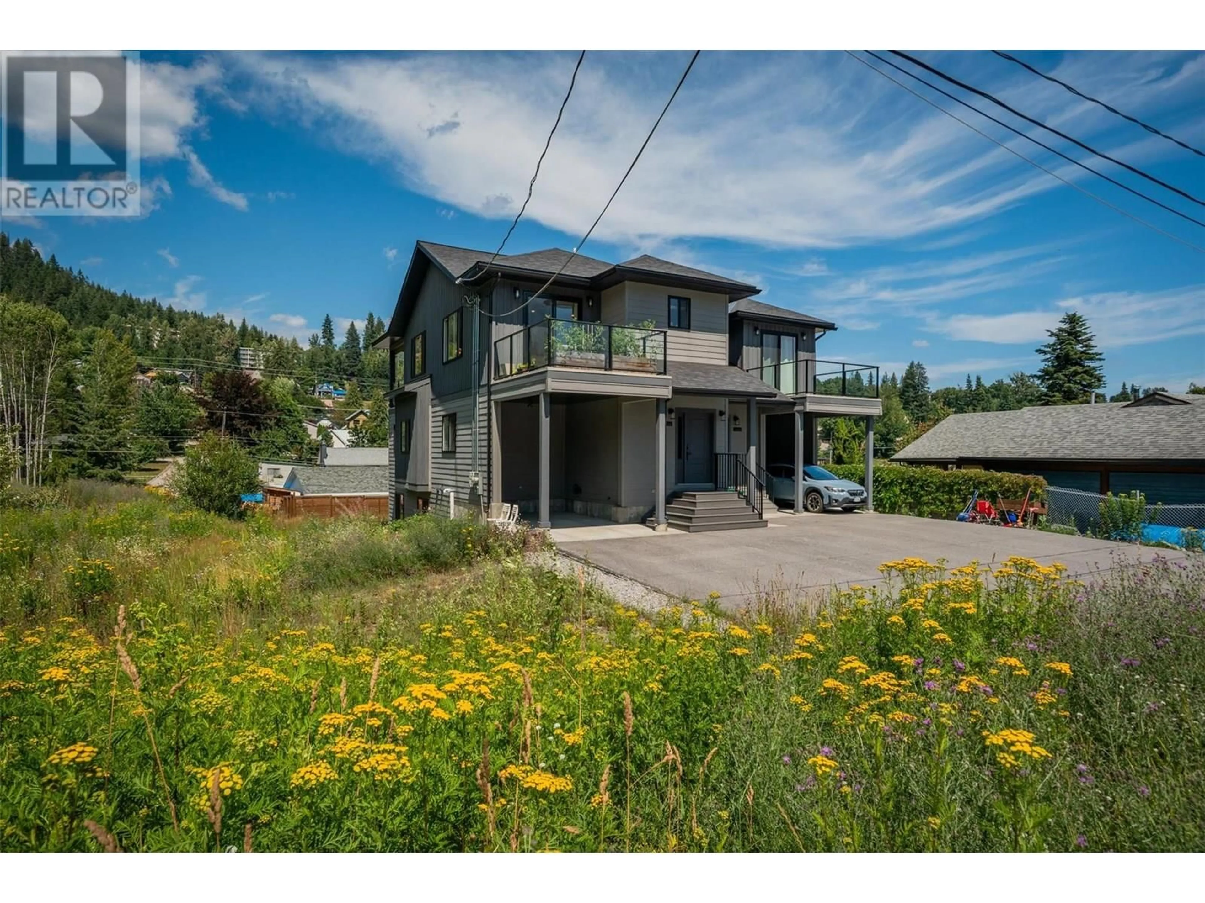 A pic from outside/outdoor area/front of a property/back of a property/a pic from drone, unknown for A - 1606 THOMPSON AVENUE, Rossland British Columbia V0G1Y0