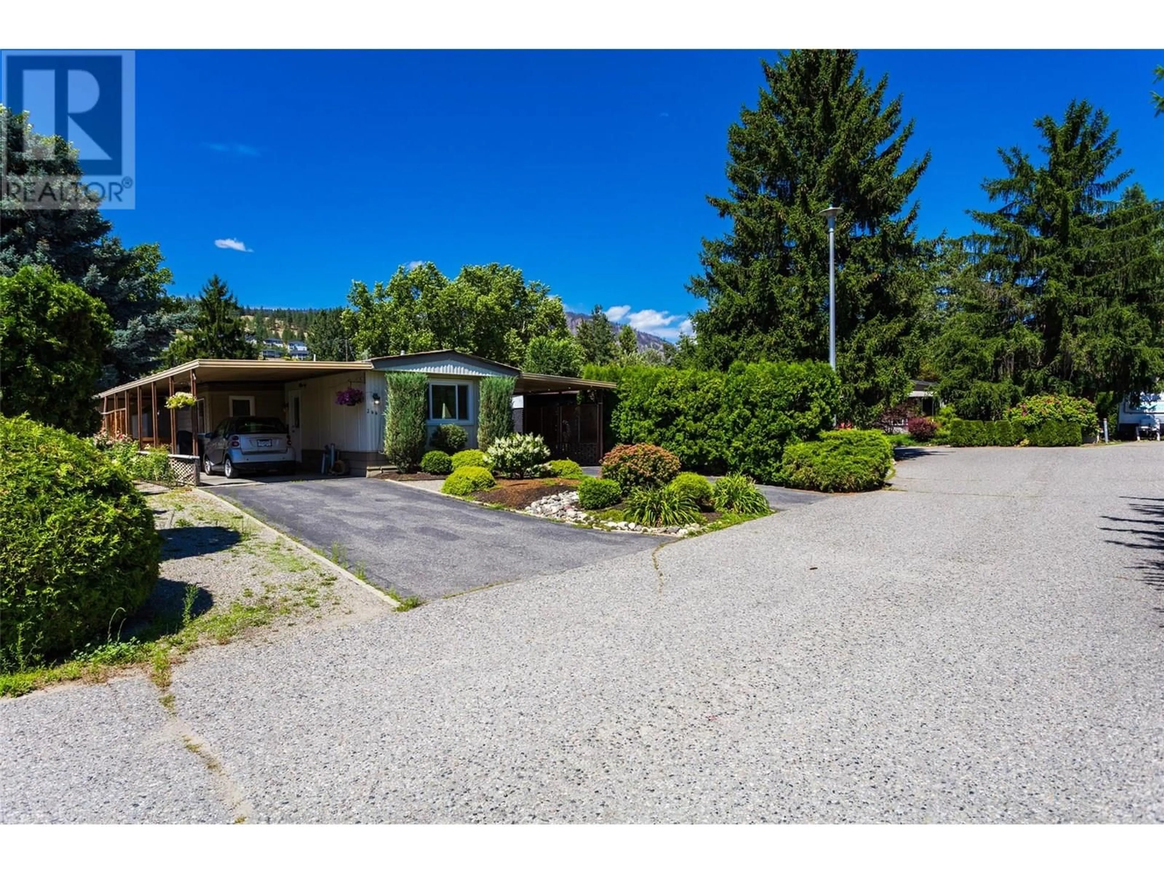 A pic from outside/outdoor area/front of a property/back of a property/a pic from drone, street for 244 - 2001 HIGHWAY 97 SOUTH OTHER, West Kelowna British Columbia V1Z3E3