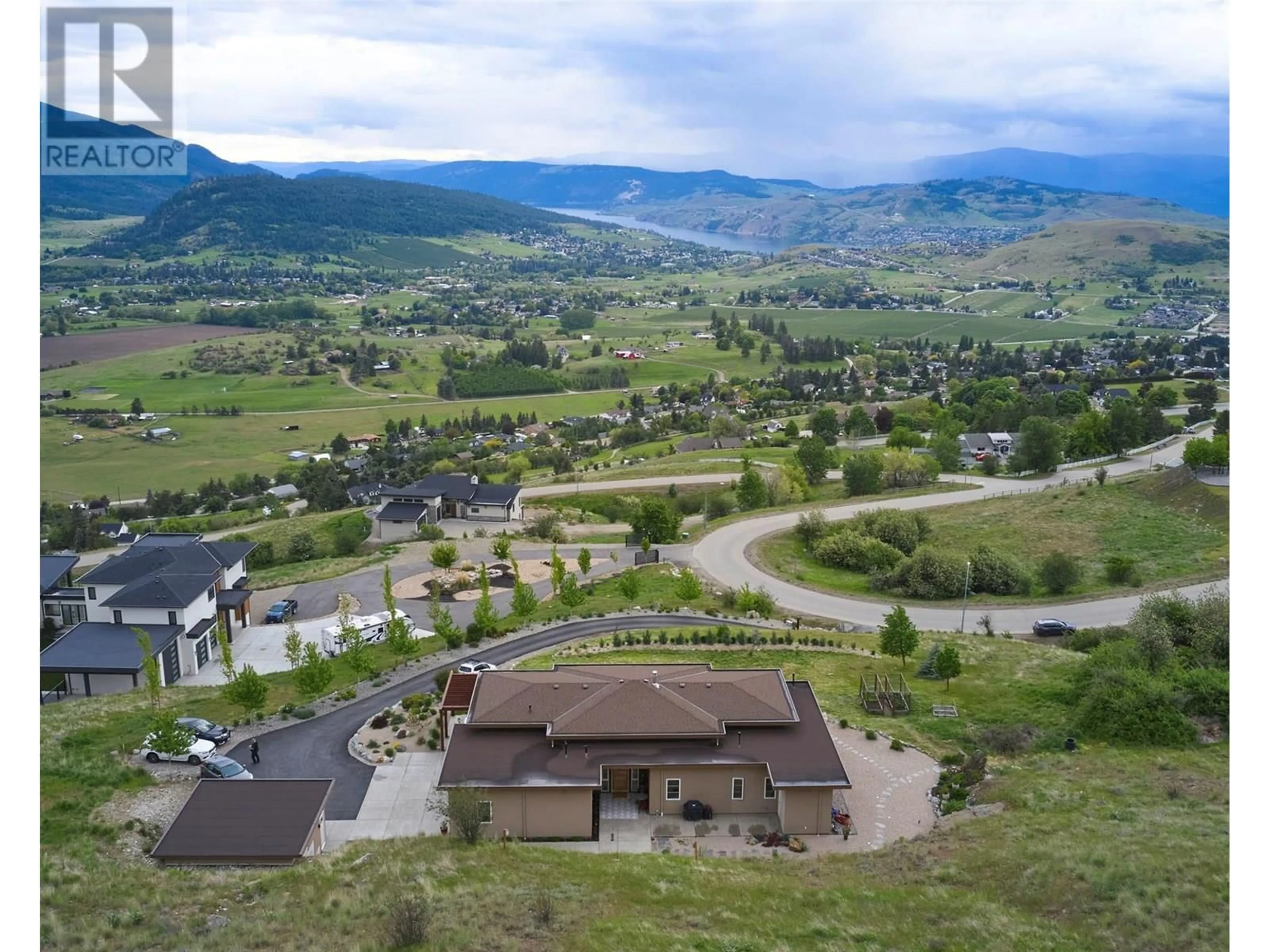A pic from outside/outdoor area/front of a property/back of a property/a pic from drone, mountain view for 56 RAVINE DRIVE, Coldstream British Columbia V1B4C9