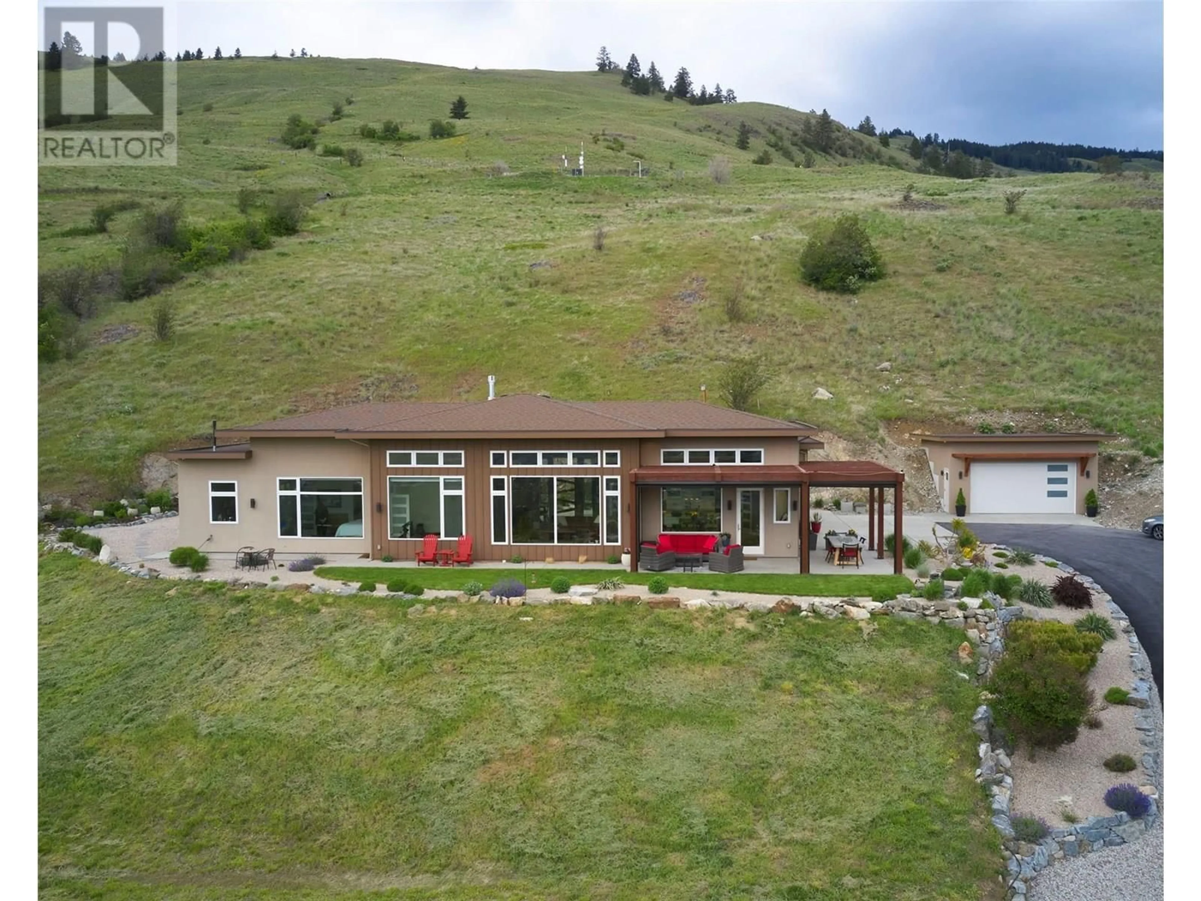 A pic from outside/outdoor area/front of a property/back of a property/a pic from drone, unknown for 56 RAVINE DRIVE, Coldstream British Columbia V1B4C9