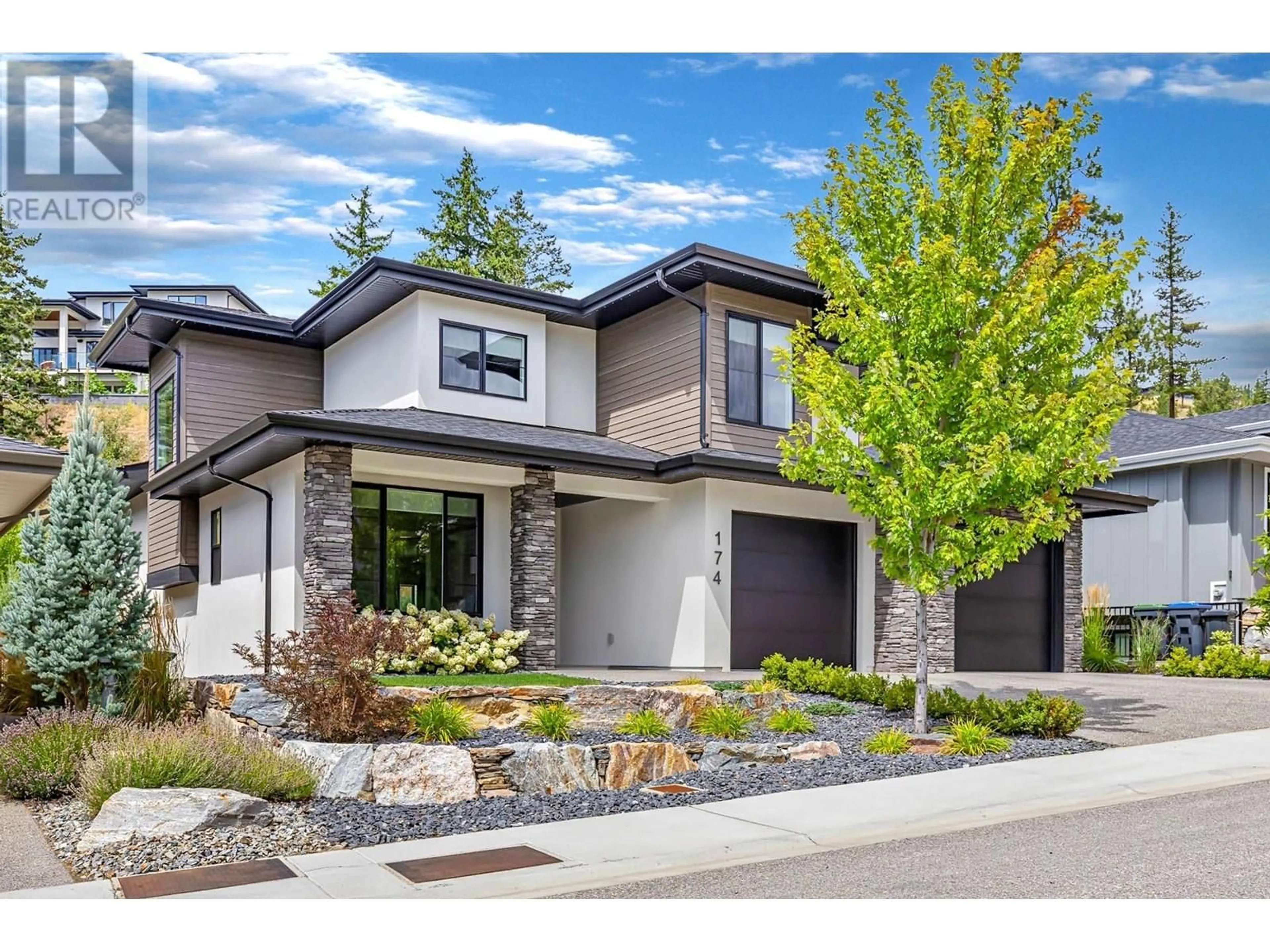 Home with brick exterior material, street for 174 ECHO RIDGE DRIVE, Kelowna British Columbia V1V0C9