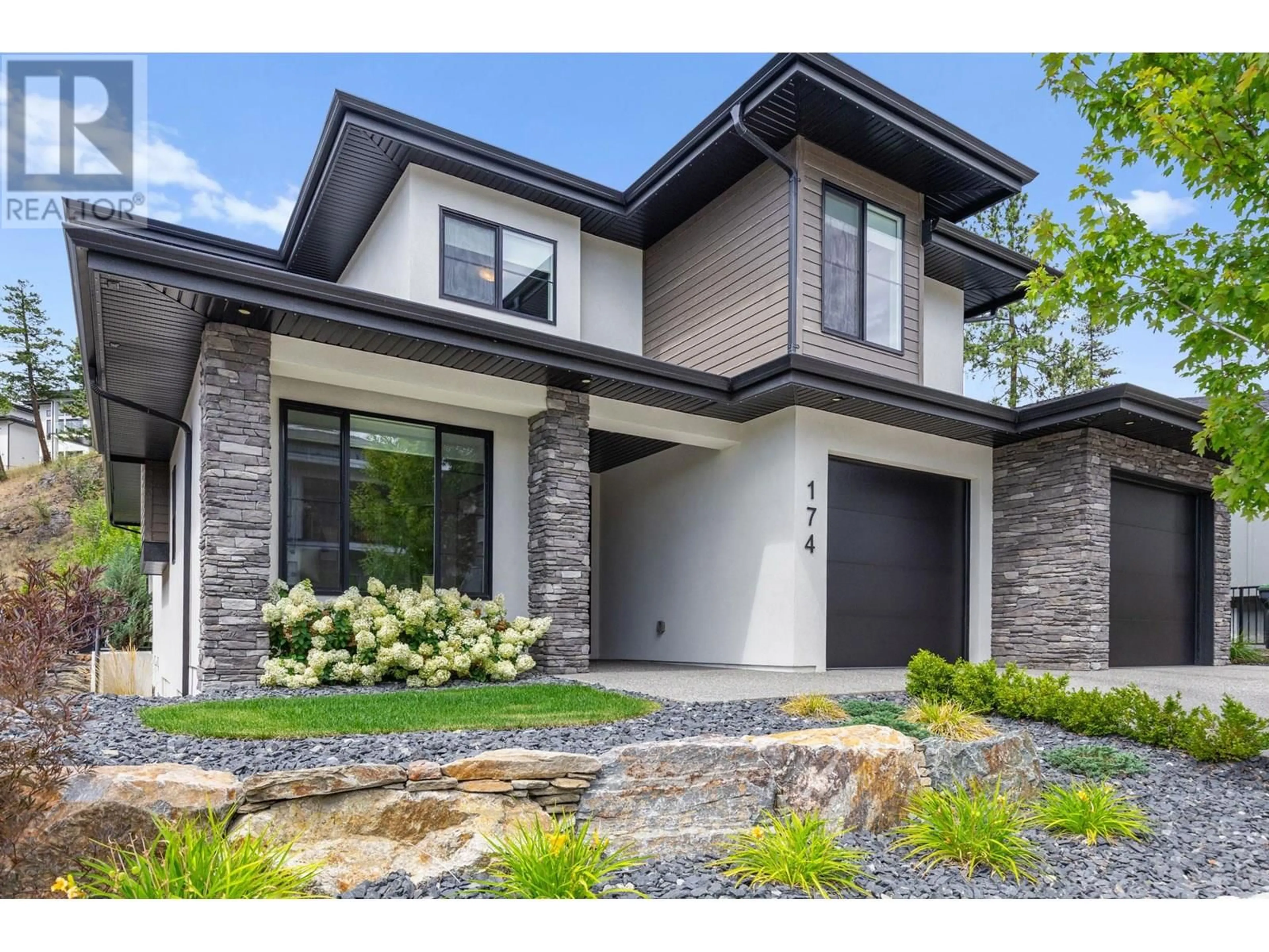Home with brick exterior material, street for 174 ECHO RIDGE DRIVE, Kelowna British Columbia V1V0C9