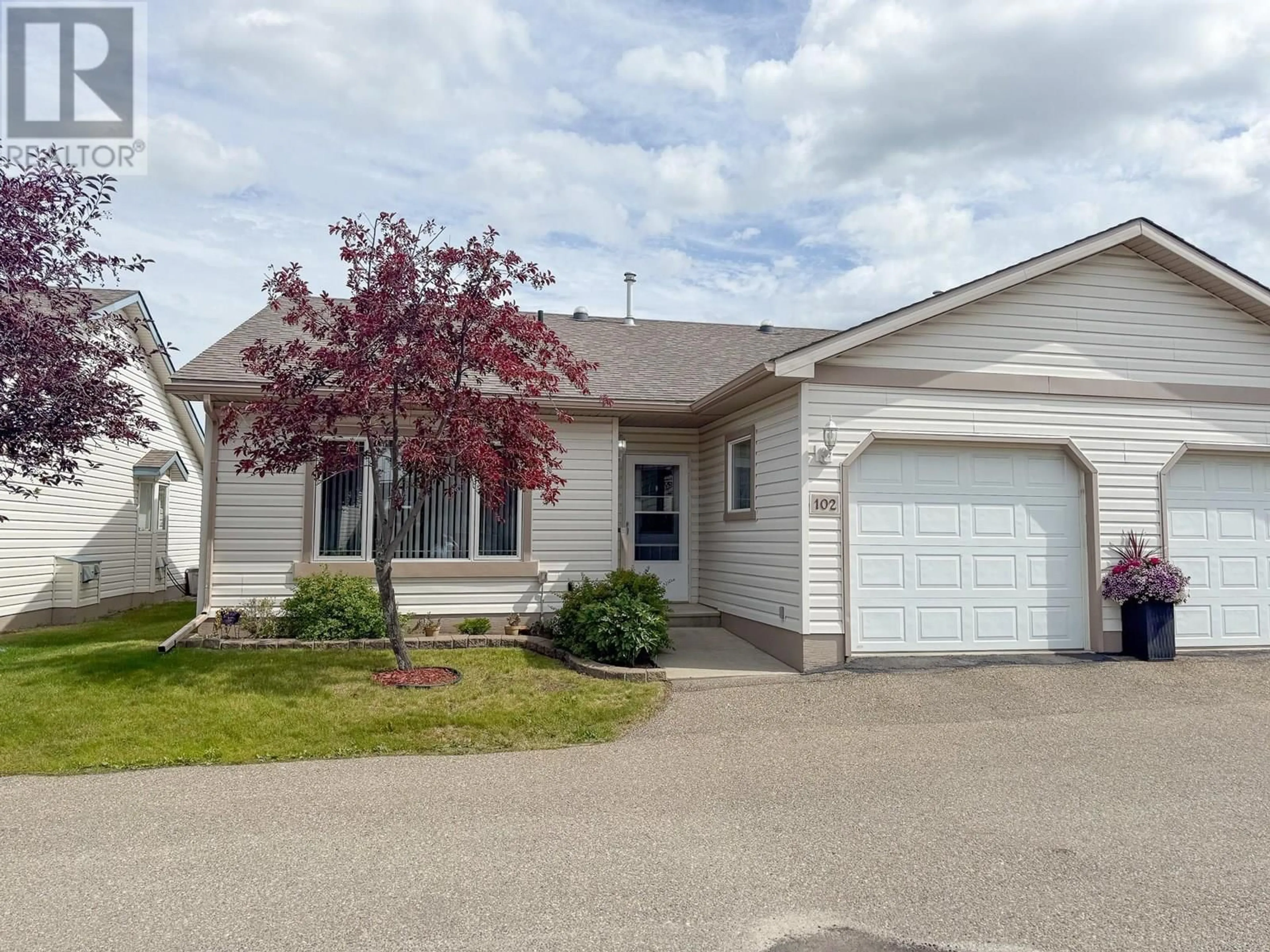 Home with vinyl exterior material, street for 102 - 1708 108 AVENUE, Dawson Creek British Columbia V1G2T7