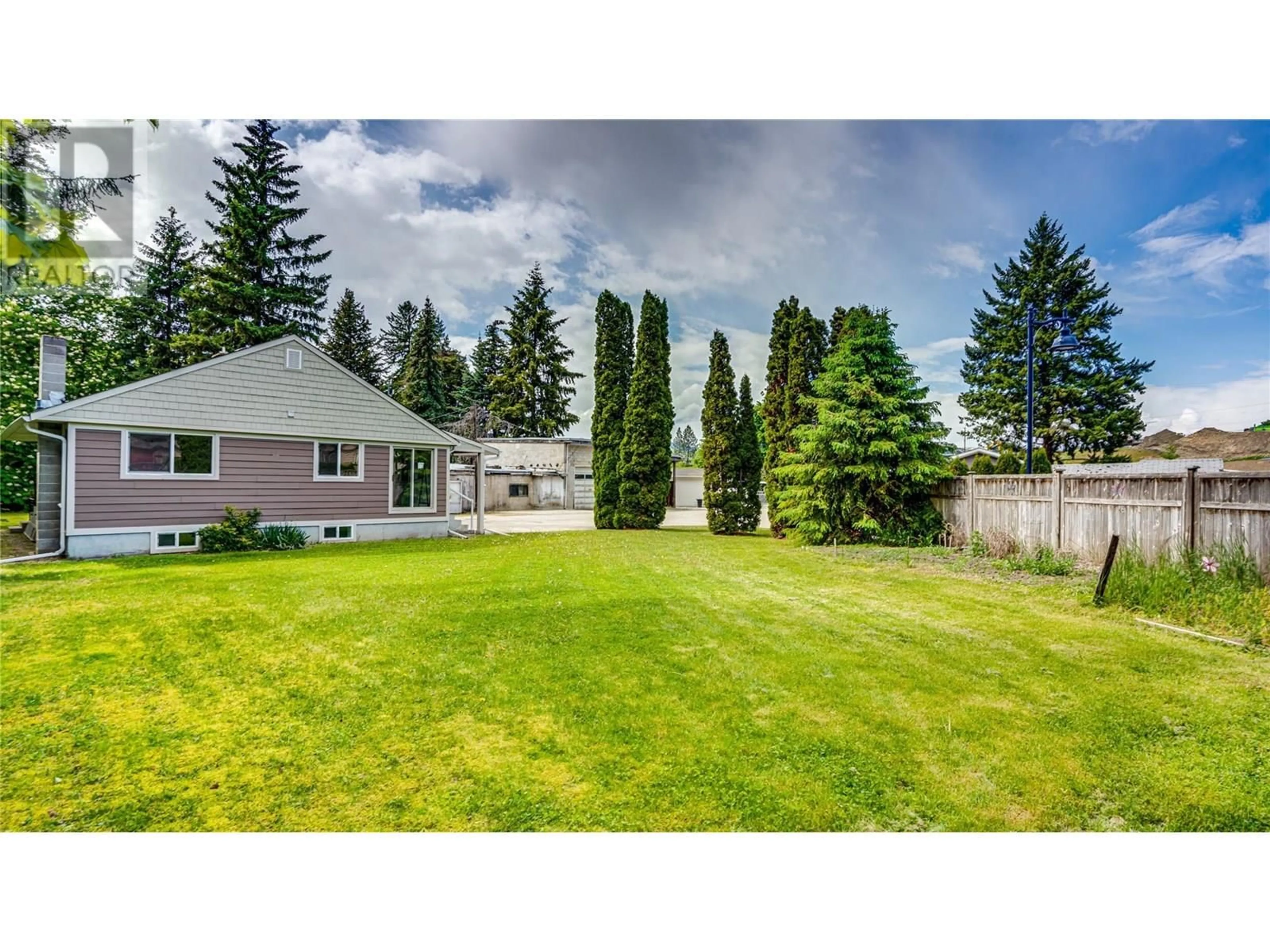 A pic from outside/outdoor area/front of a property/back of a property/a pic from drone, unknown for 4615 PLEASANT VALLEY ROAD, Vernon British Columbia V1T4M7