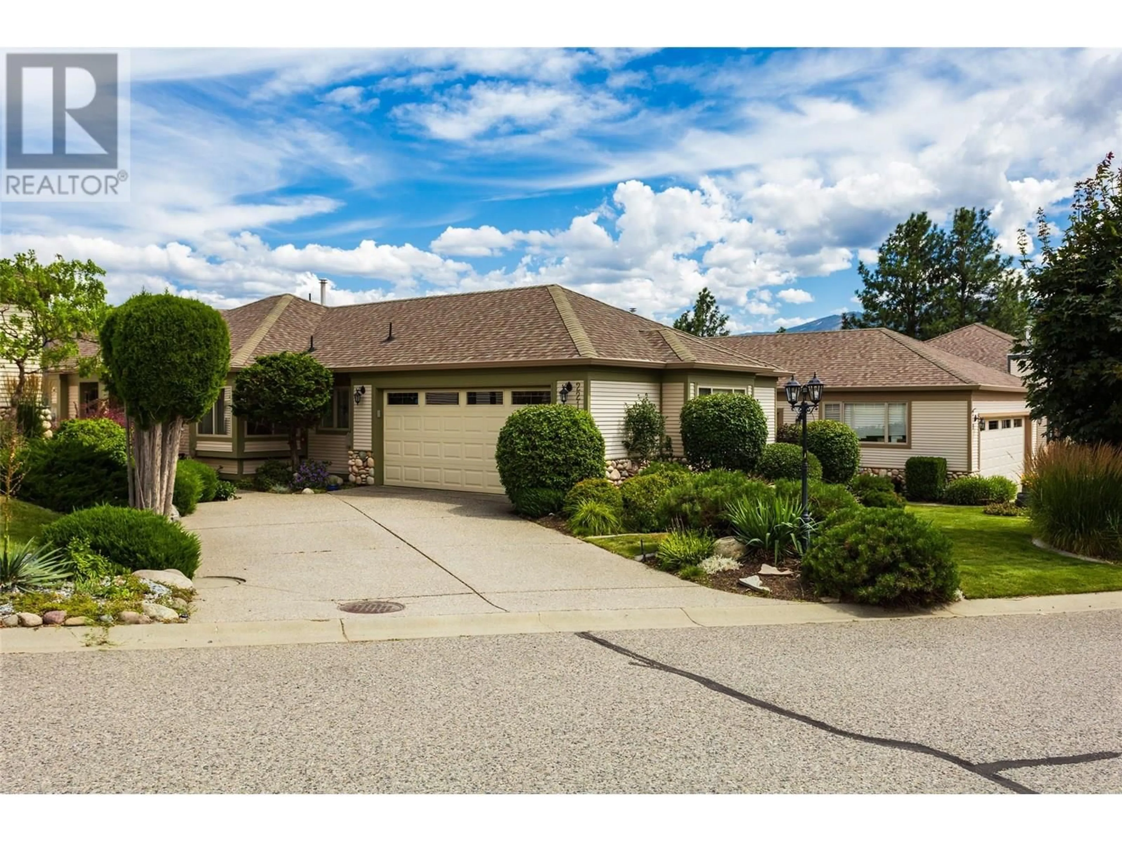 A pic from outside/outdoor area/front of a property/back of a property/a pic from drone, street for 221 - 4074 GELLATLY ROAD, West Kelowna British Columbia V4T2S8