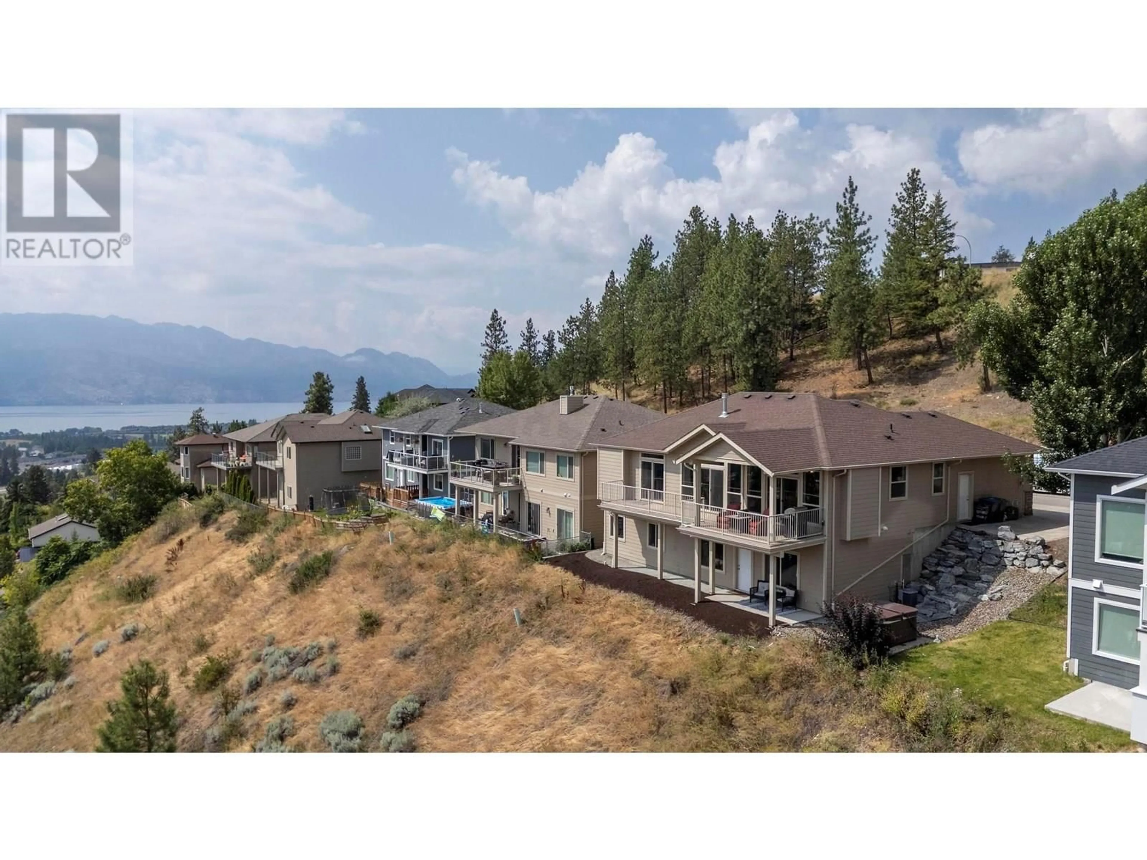 A pic from outside/outdoor area/front of a property/back of a property/a pic from drone, mountain view for 2969 ENSIGN LANE, West Kelowna British Columbia V4T2Z4