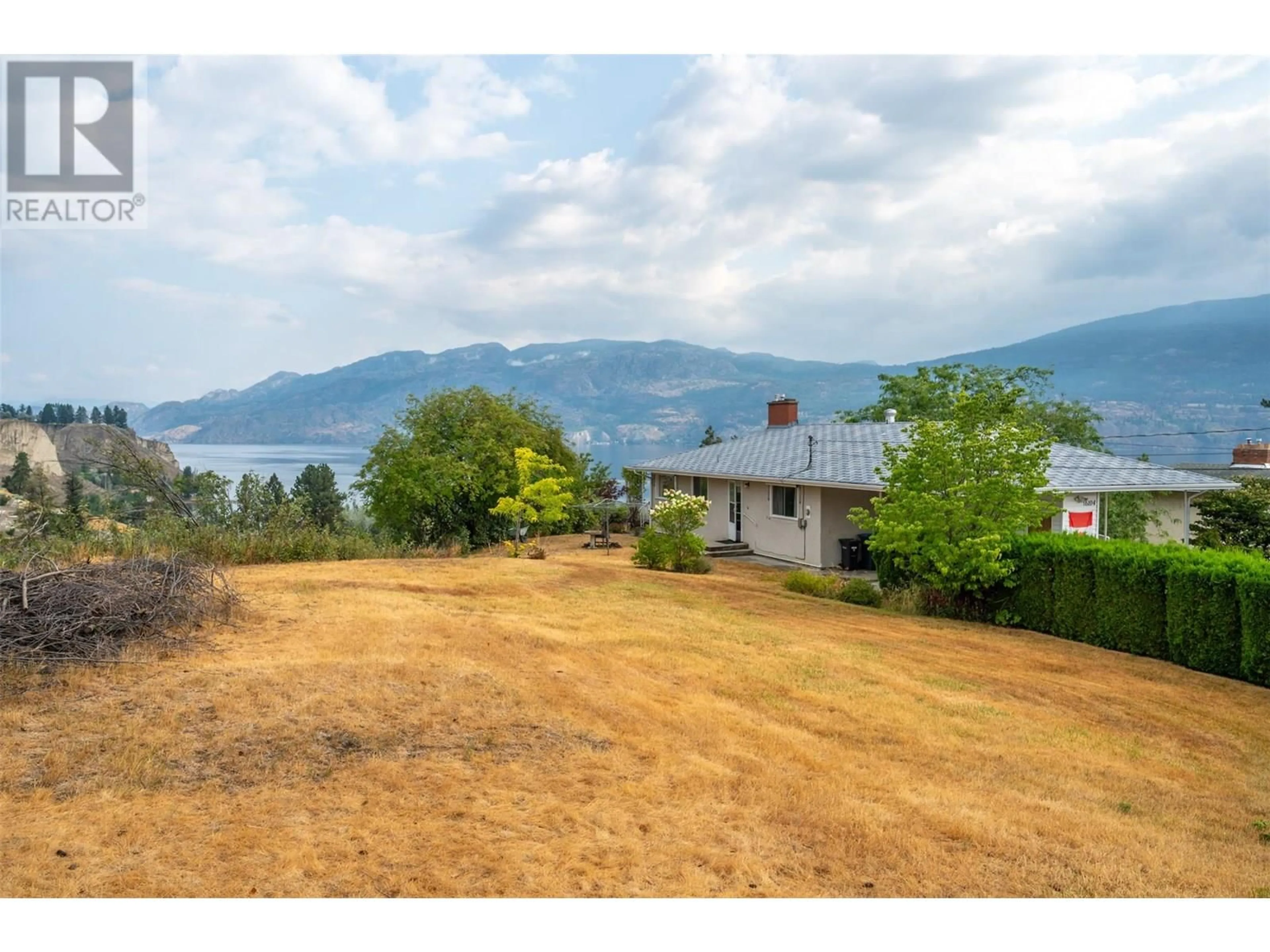 A pic from outside/outdoor area/front of a property/back of a property/a pic from drone, water/lake/river/ocean view for 6104 CUTHBERT ROAD, Summerland British Columbia V0H1Z1