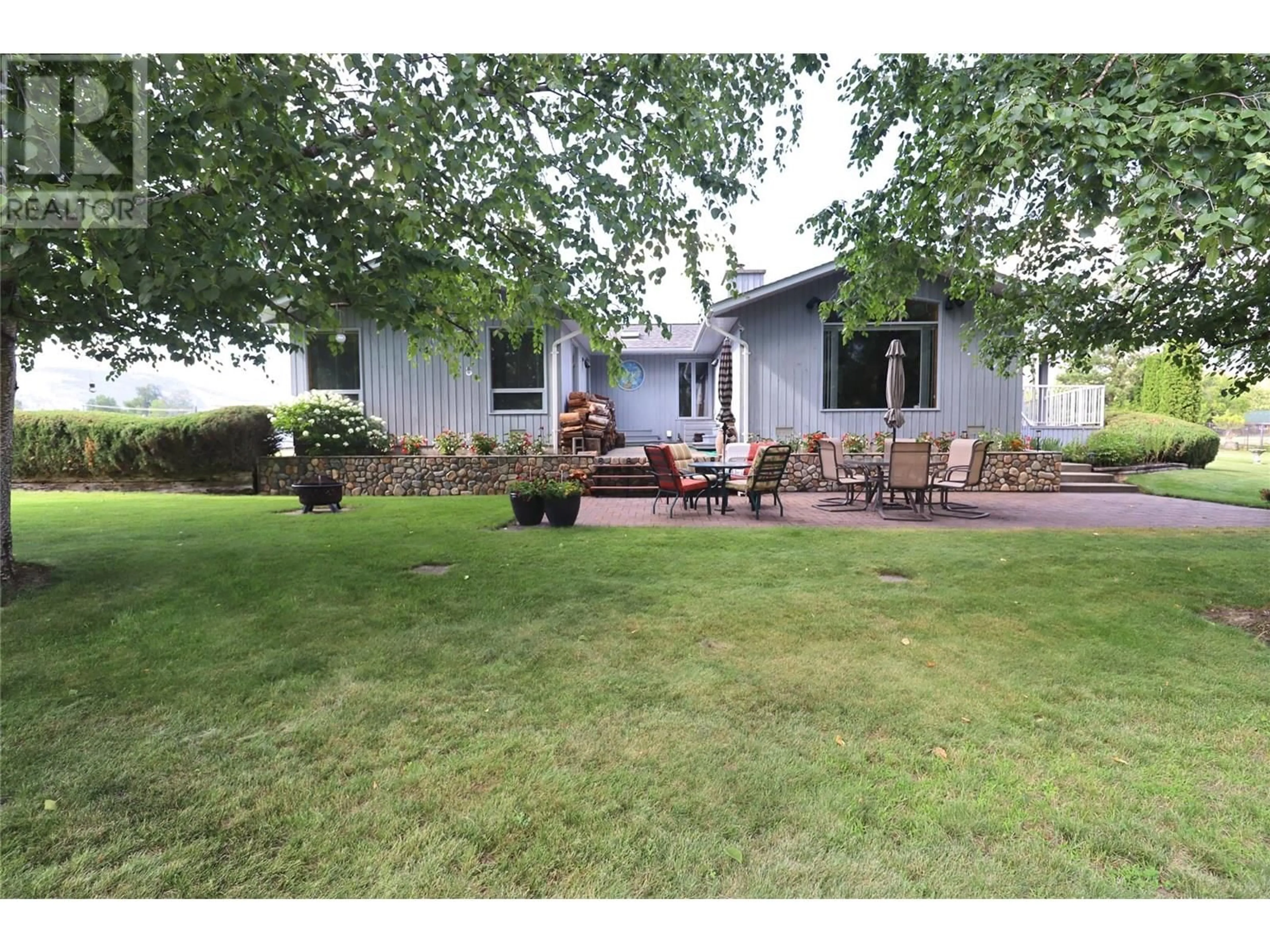 A pic from outside/outdoor area/front of a property/back of a property/a pic from drone, unknown for 5745 BEATRICE STREET, Grand Forks British Columbia V0H1H0