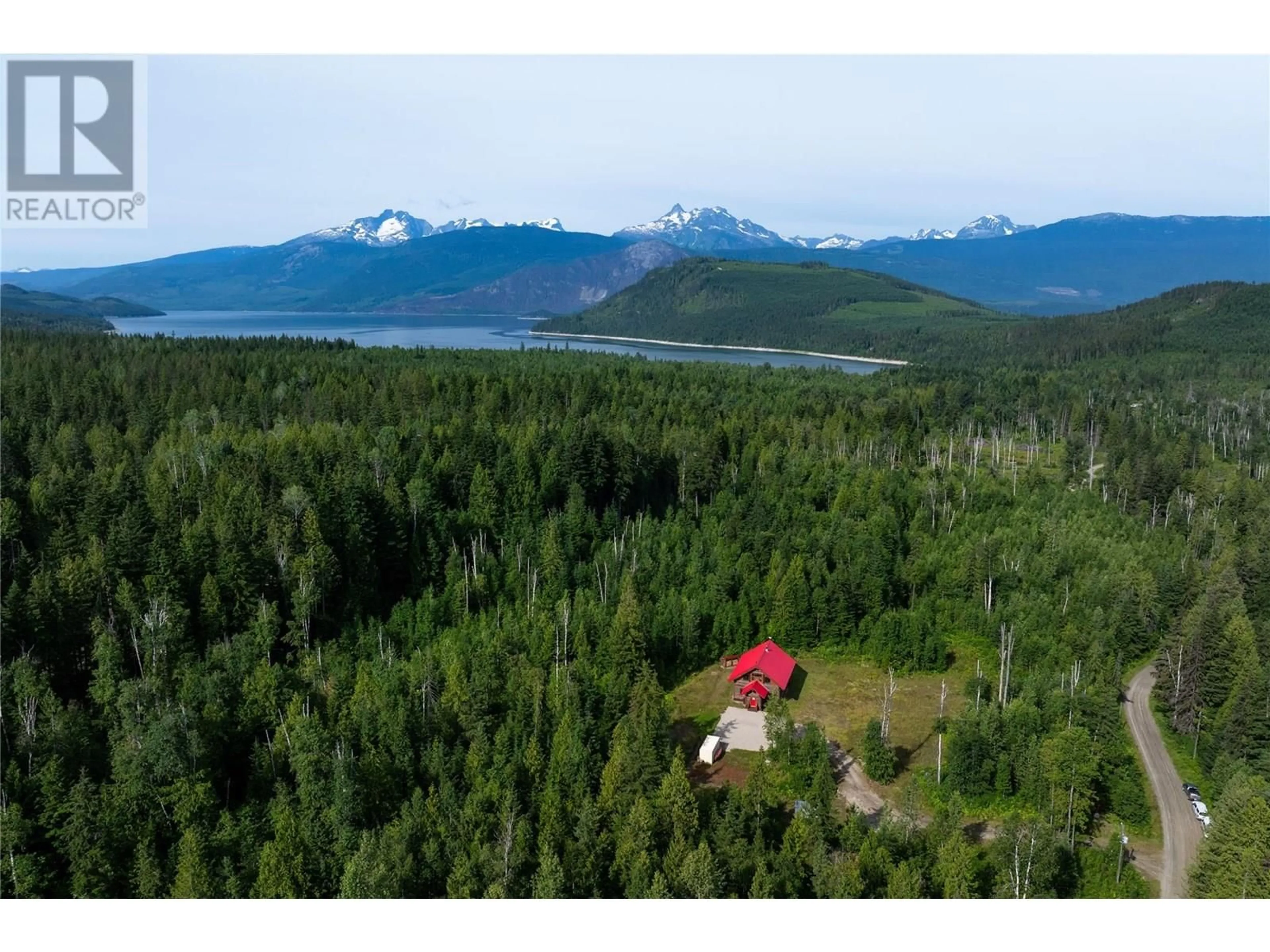 A pic from outside/outdoor area/front of a property/back of a property/a pic from drone, mountain view for 935 HILL CREEK ROAD, Galena Bay British Columbia V0G1R2