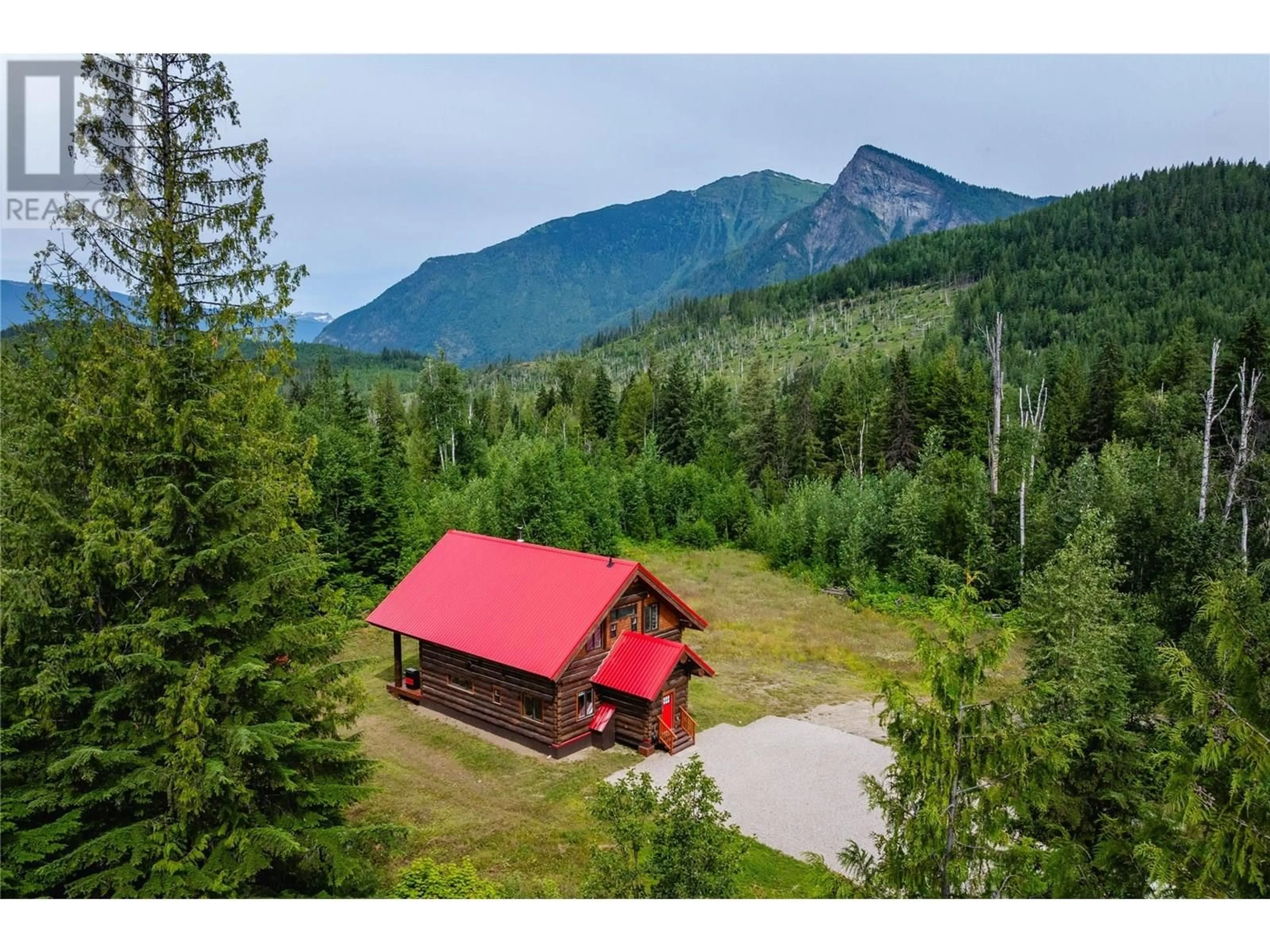A pic from outside/outdoor area/front of a property/back of a property/a pic from drone, mountain view for 935 HILL CREEK ROAD, Galena Bay British Columbia V0G1R2