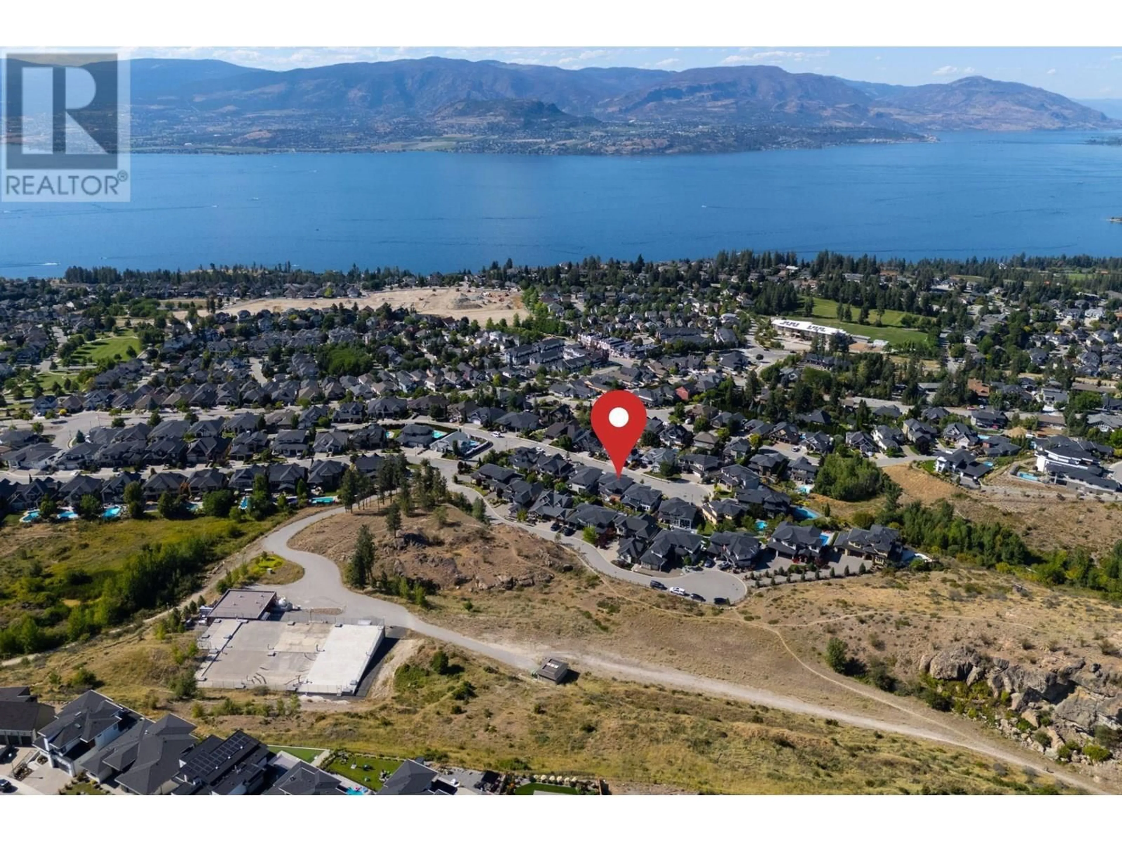 A pic from outside/outdoor area/front of a property/back of a property/a pic from drone, water/lake/river/ocean view for 453 LAKEPOINTE DRIVE, Kelowna British Columbia V1W5K2