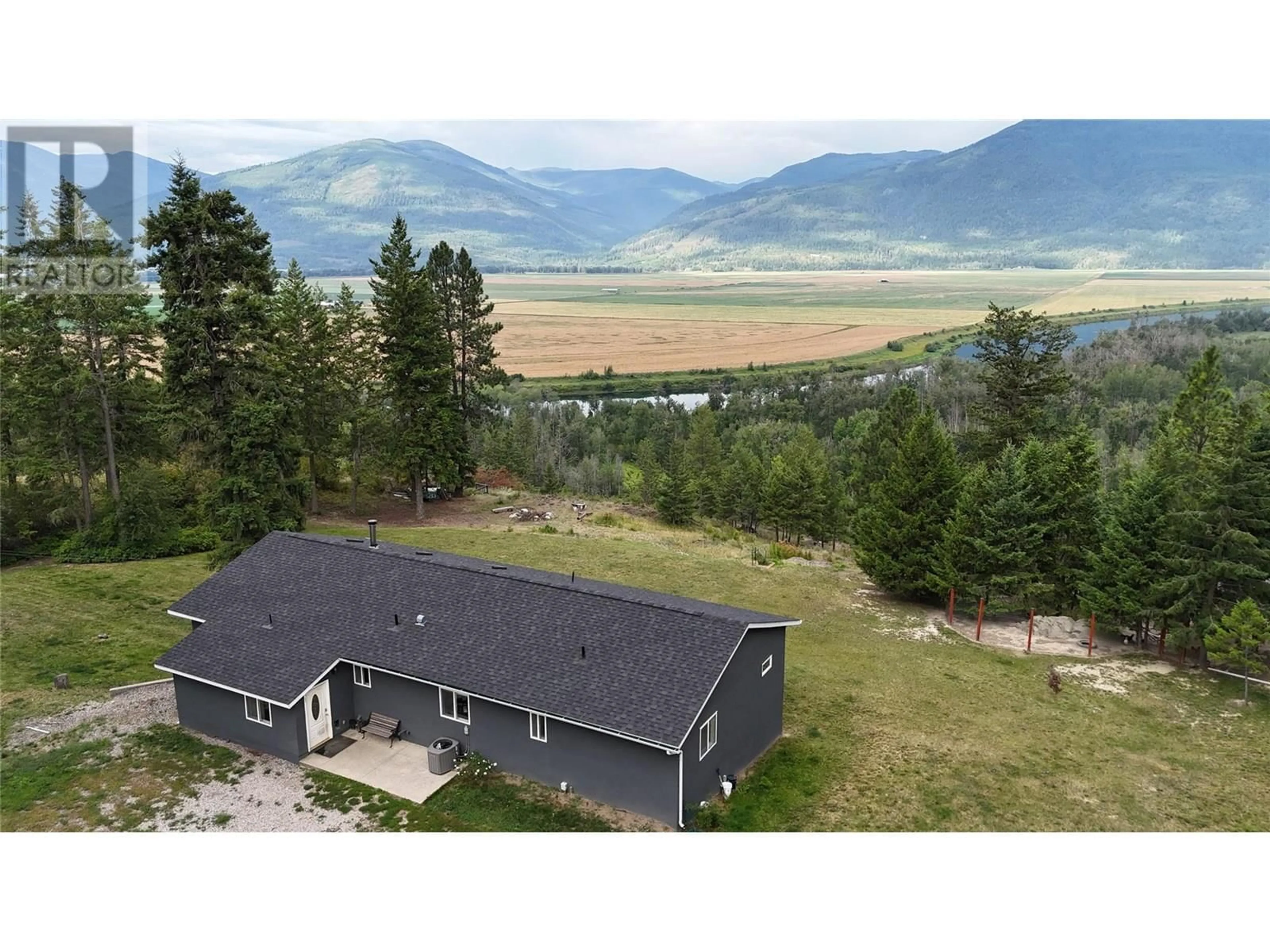 A pic from outside/outdoor area/front of a property/back of a property/a pic from drone, mountain view for 1325 FOX TREE HILL ROAD, Creston British Columbia V0B1G2