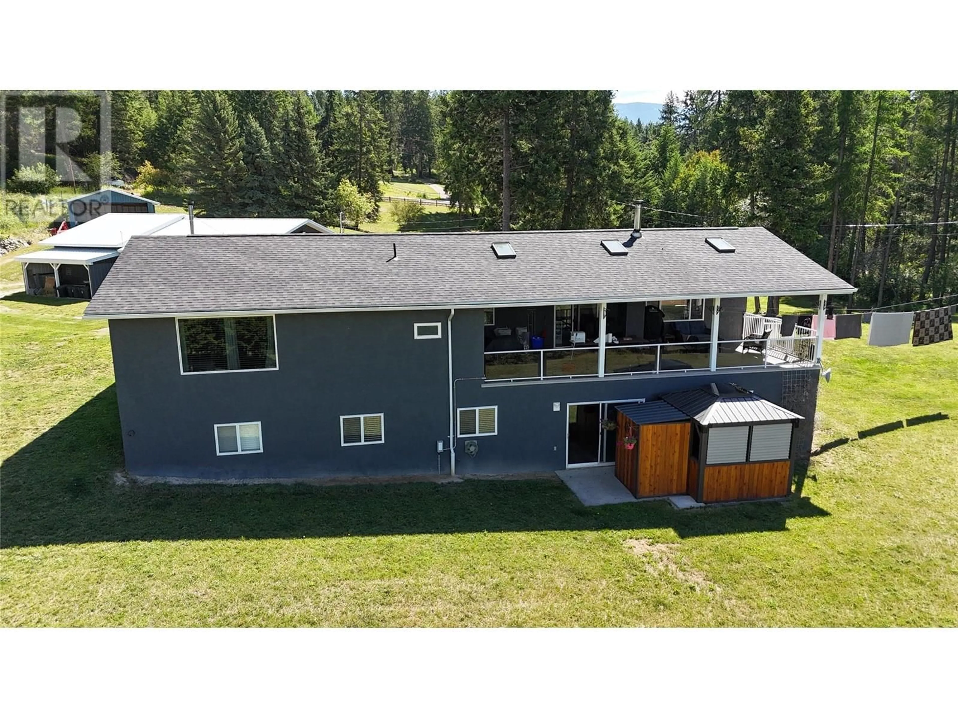 A pic from outside/outdoor area/front of a property/back of a property/a pic from drone, unknown for 1325 FOX TREE HILL ROAD, Creston British Columbia V0B1G2