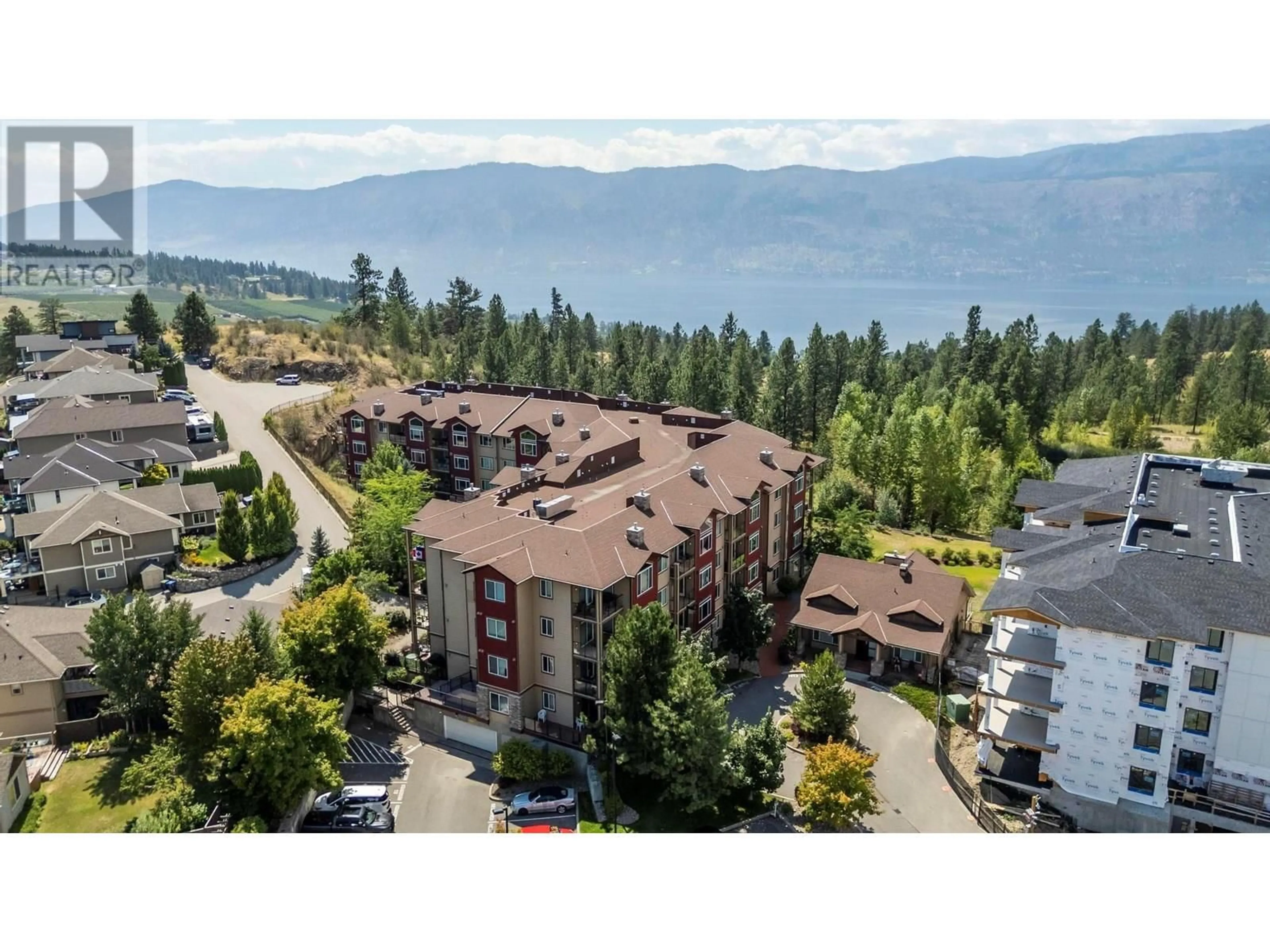A pic from outside/outdoor area/front of a property/back of a property/a pic from drone, mountain view for 102 - 2532 SHORELINE DRIVE, Lake Country British Columbia V4V2R6