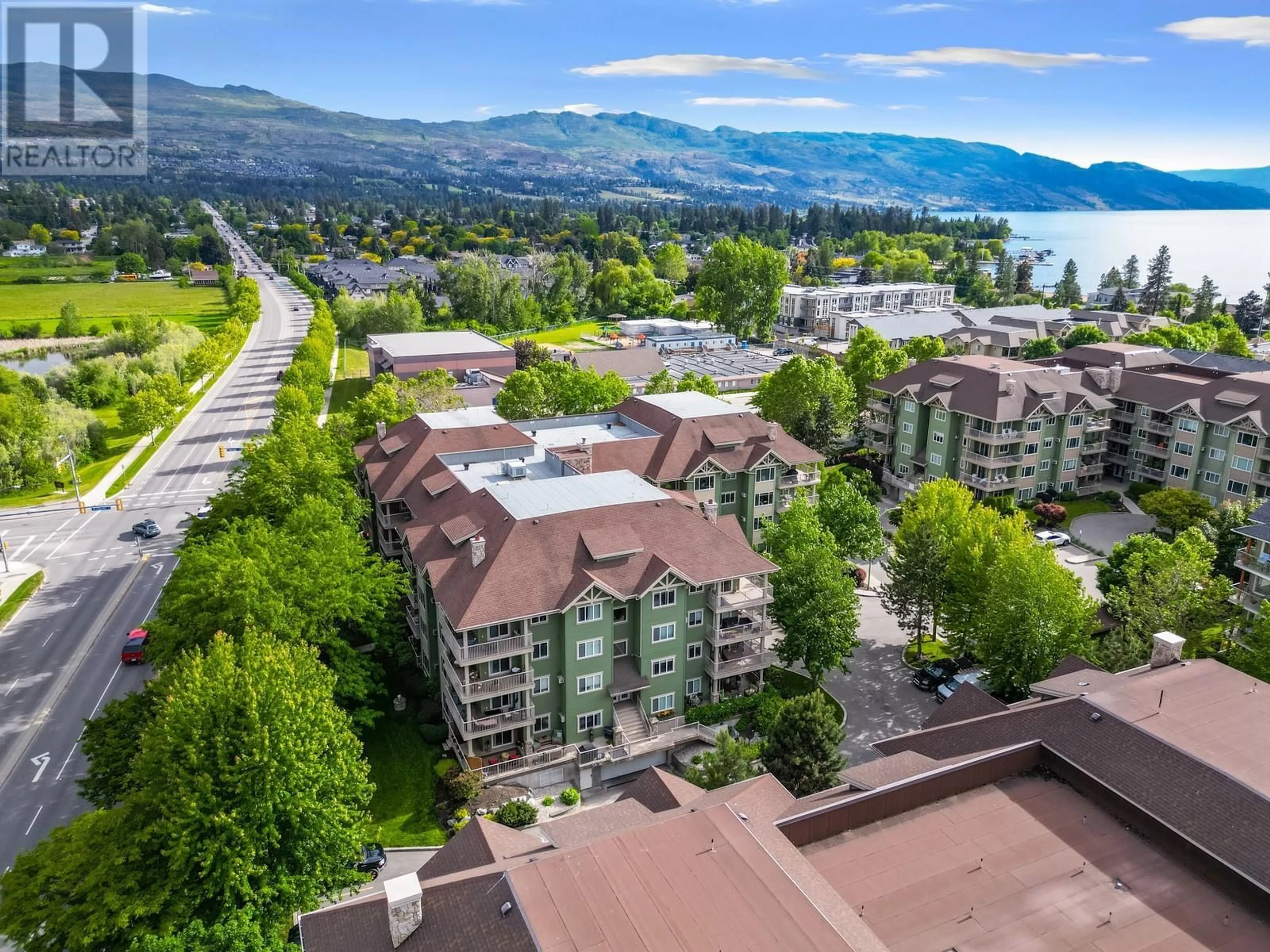A pic from outside/outdoor area/front of a property/back of a property/a pic from drone, mountain view for 409 - 686 LEQUIME ROAD, Kelowna British Columbia V1W1A4