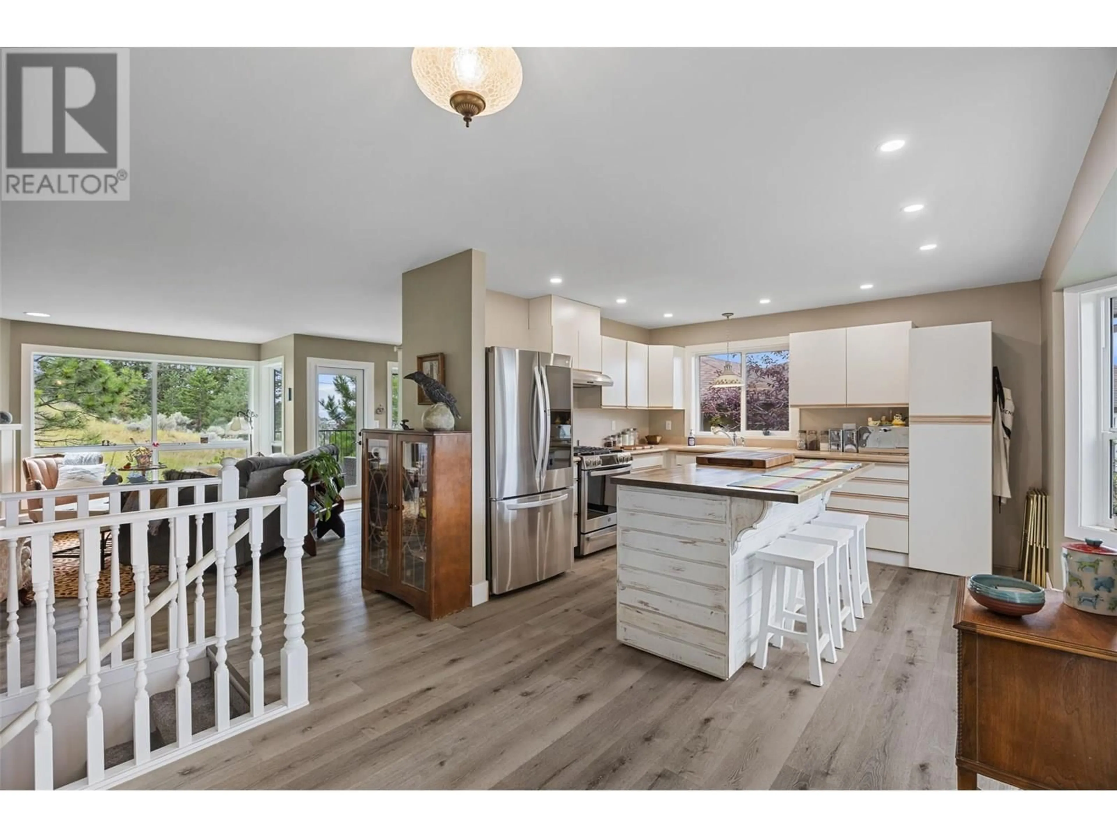 Open concept kitchen, wood/laminate floor for 7 - 2020 VAN HORNE DRIVE, Kamloops British Columbia V1S1G3