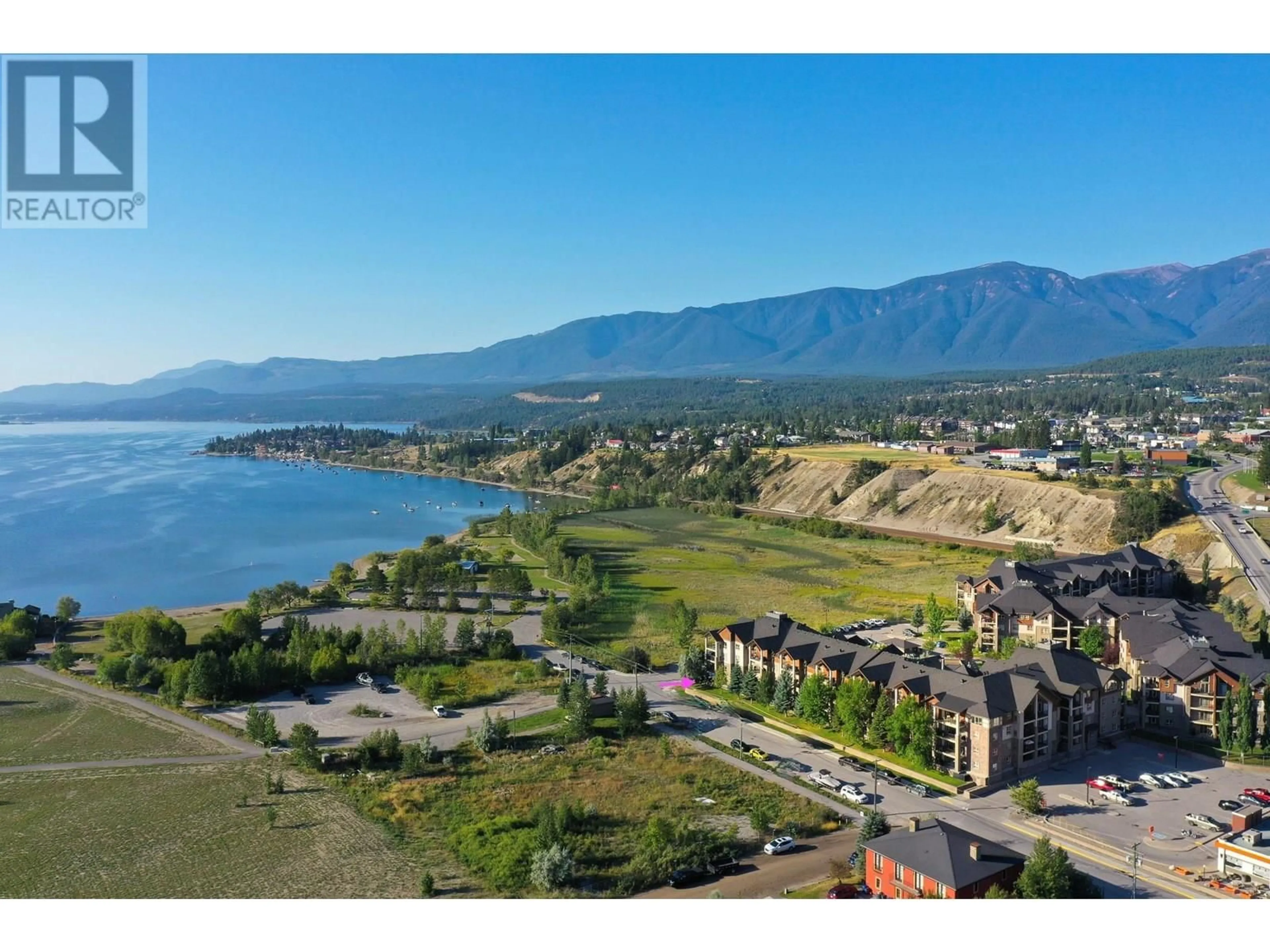A pic from outside/outdoor area/front of a property/back of a property/a pic from drone, water/lake/river/ocean view for 2114 - 205 THIRD AVENUE, Invermere British Columbia V0A1K7