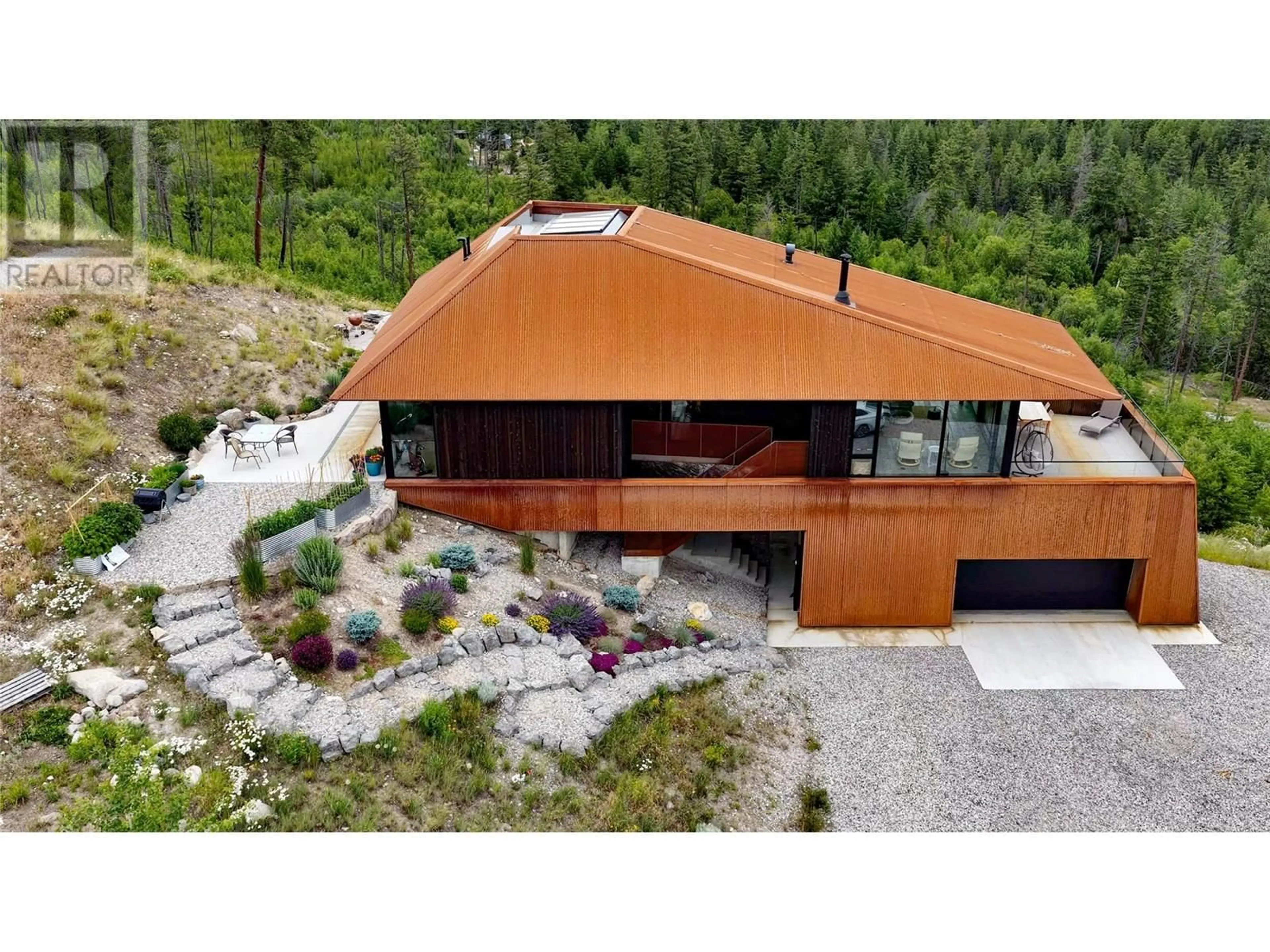 A pic from outside/outdoor area/front of a property/back of a property/a pic from drone, unknown for 7080 GLENFIR ROAD, Naramata British Columbia V0H1N1