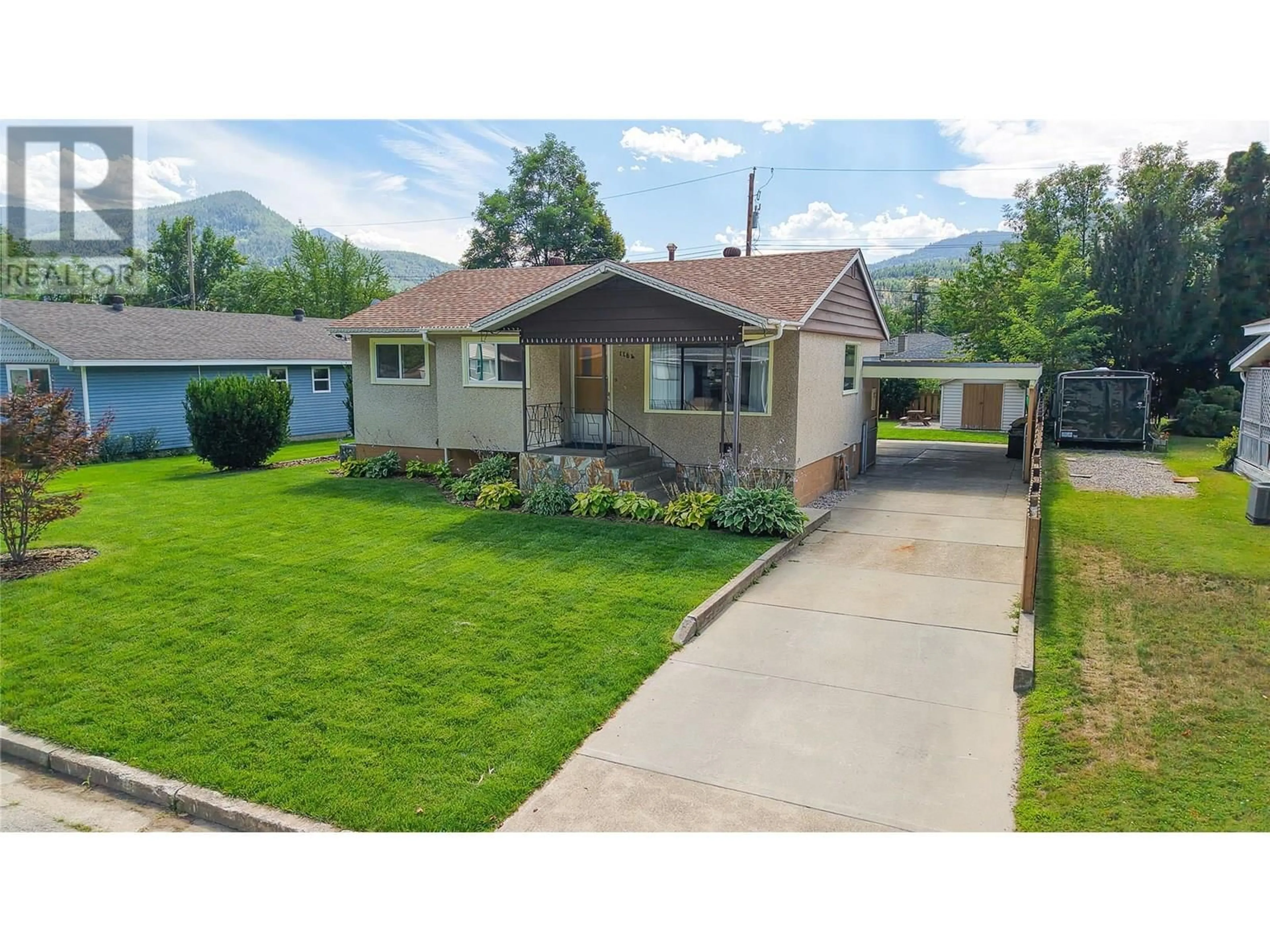 A pic from outside/outdoor area/front of a property/back of a property/a pic from drone, street for 1164 MARIANNA CRESCENT, Trail British Columbia V1R1E1