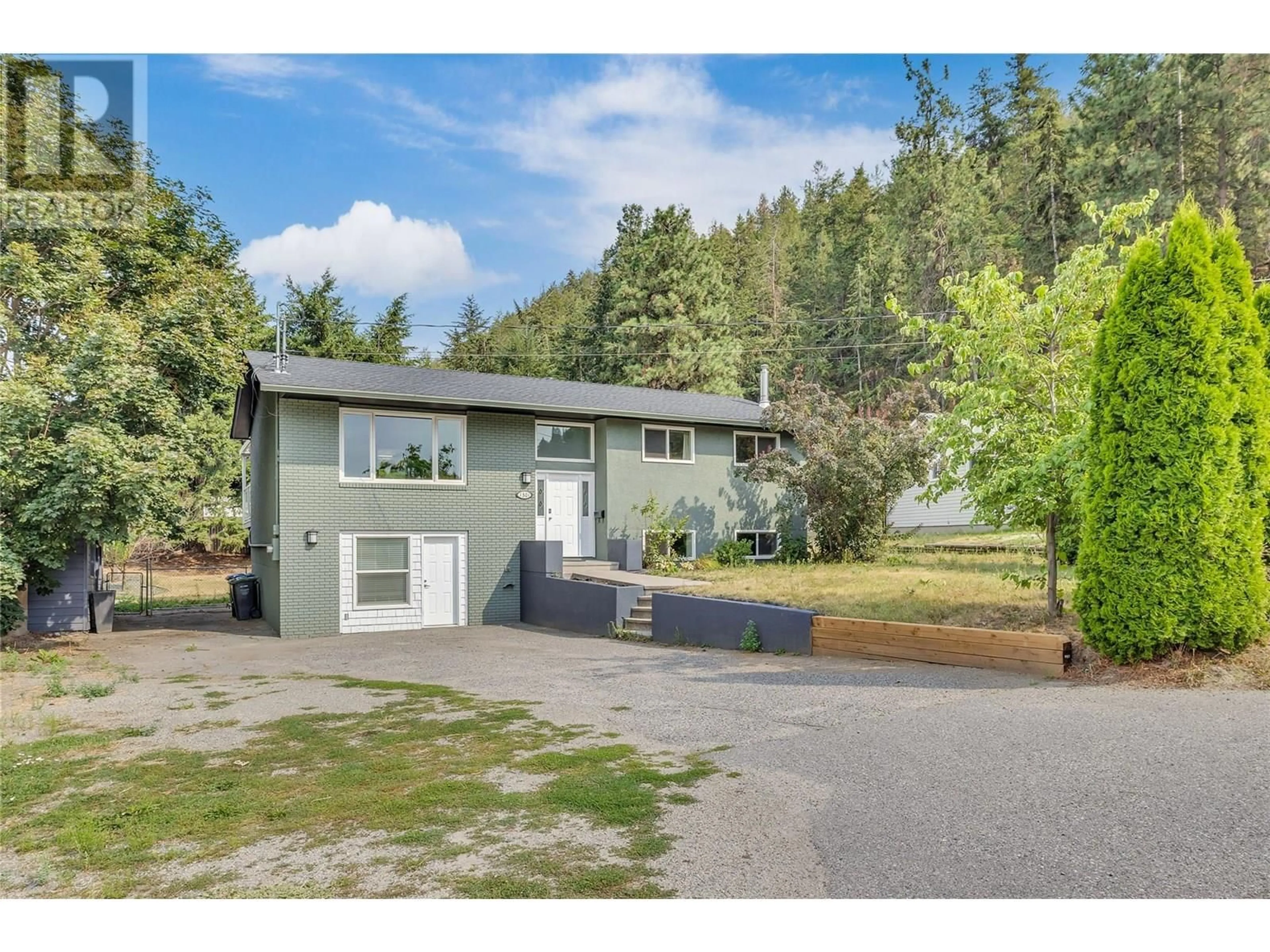 A pic from outside/outdoor area/front of a property/back of a property/a pic from drone, unknown for 1301 PONDEROSA ROAD, West Kelowna British Columbia V1Z1M8