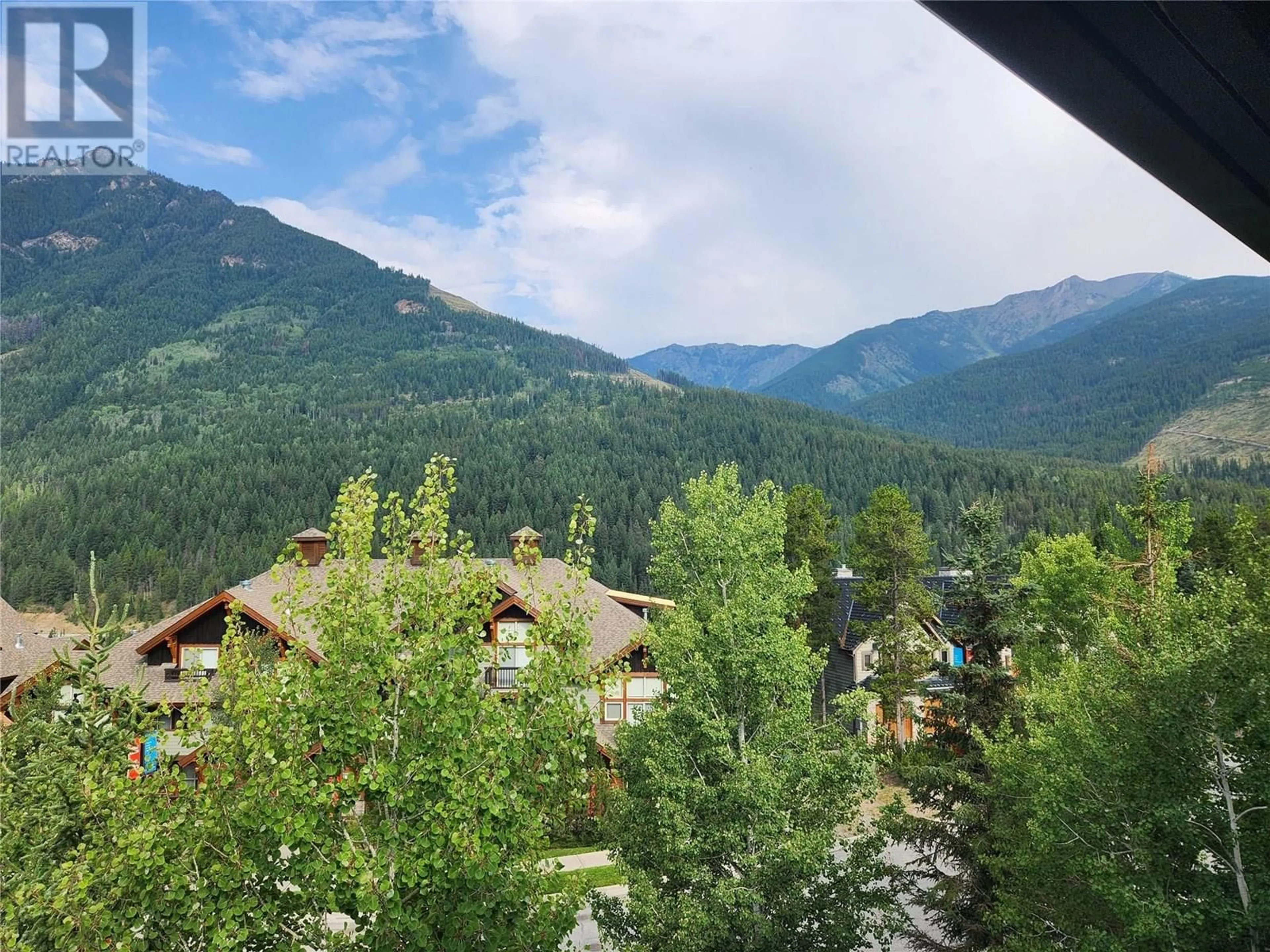 A pic from outside/outdoor area/front of a property/back of a property/a pic from drone, mountain view for 412 - 2060 SUMMIT DRIVE, Panorama British Columbia V0A1T0