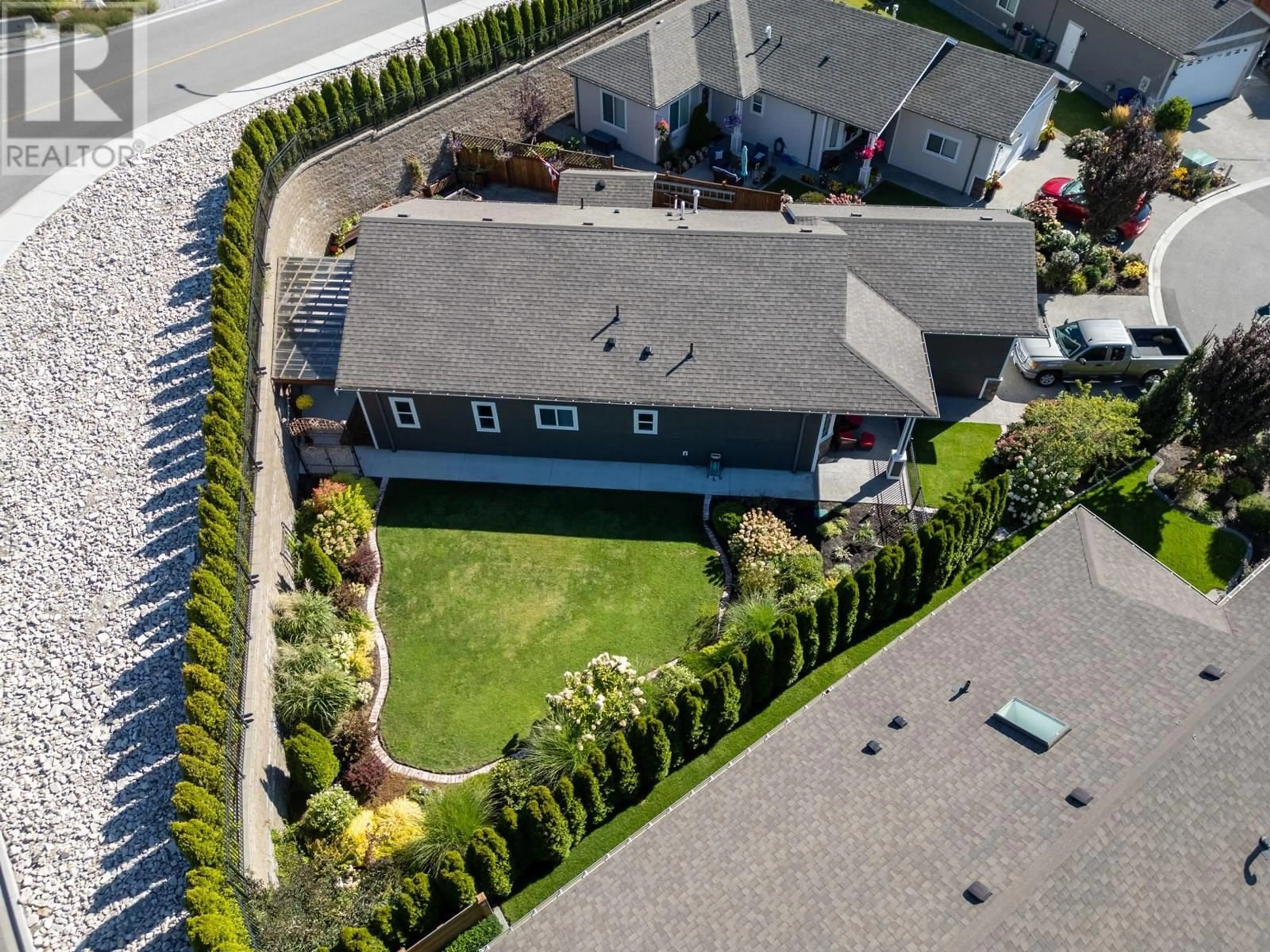 A pic from outside/outdoor area/front of a property/back of a property/a pic from drone, street for 2072 SAGE CRESCENT, Westbank British Columbia V4T3A5