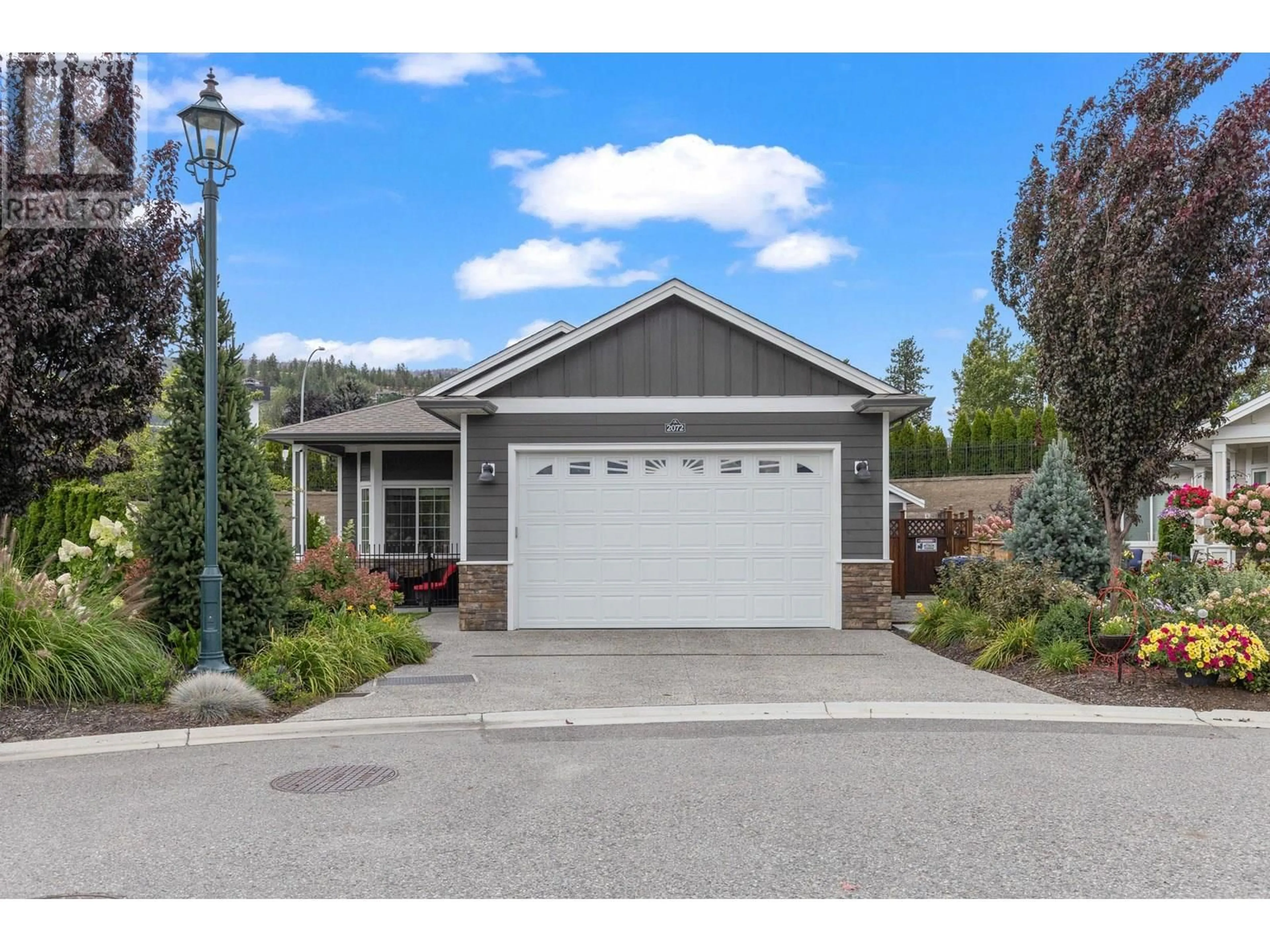 Home with vinyl exterior material, street for 2072 SAGE CRESCENT, Westbank British Columbia V4T3A5