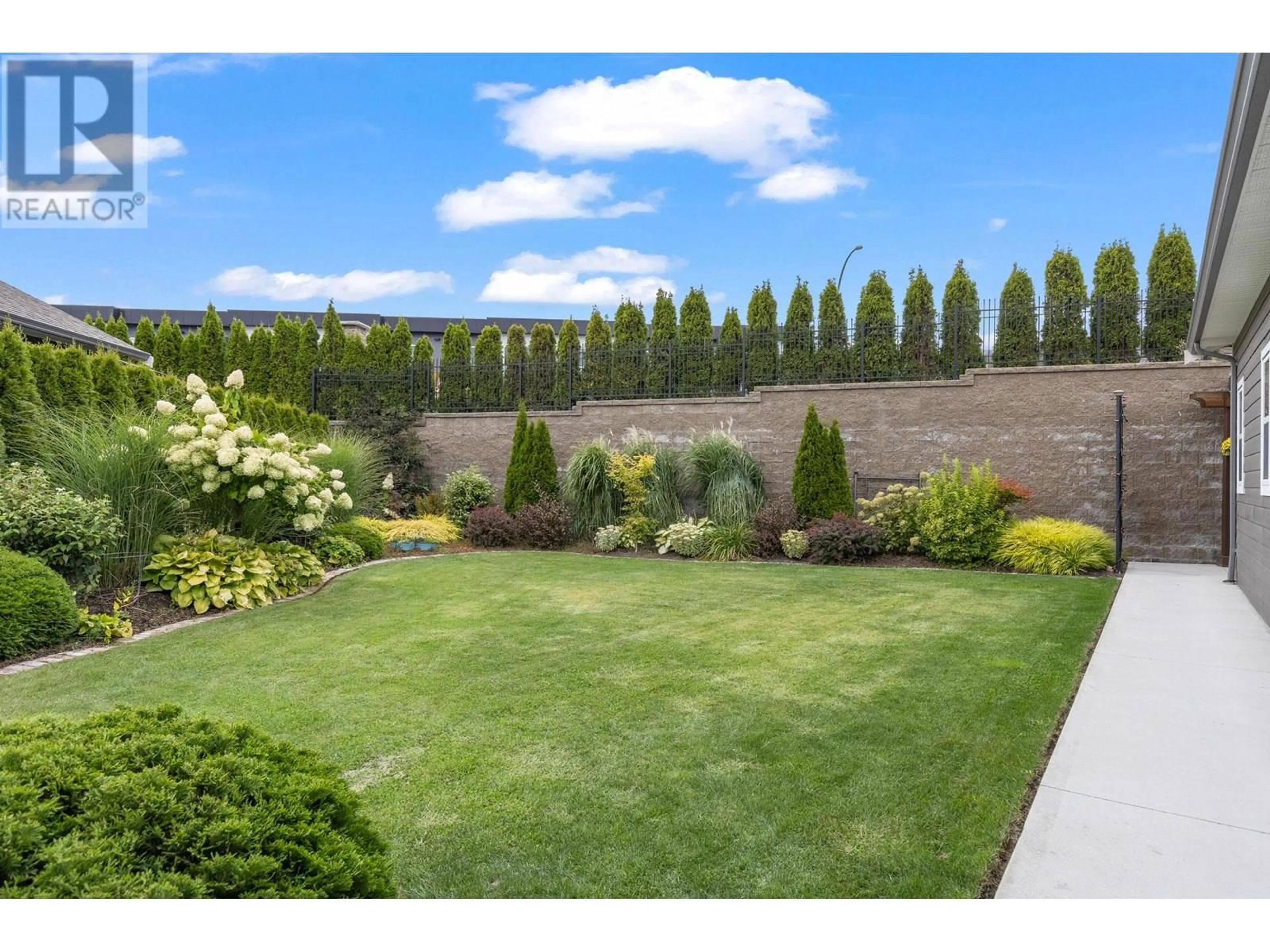 A pic from outside/outdoor area/front of a property/back of a property/a pic from drone, unknown for 2072 SAGE CRESCENT, Westbank British Columbia V4T3A5