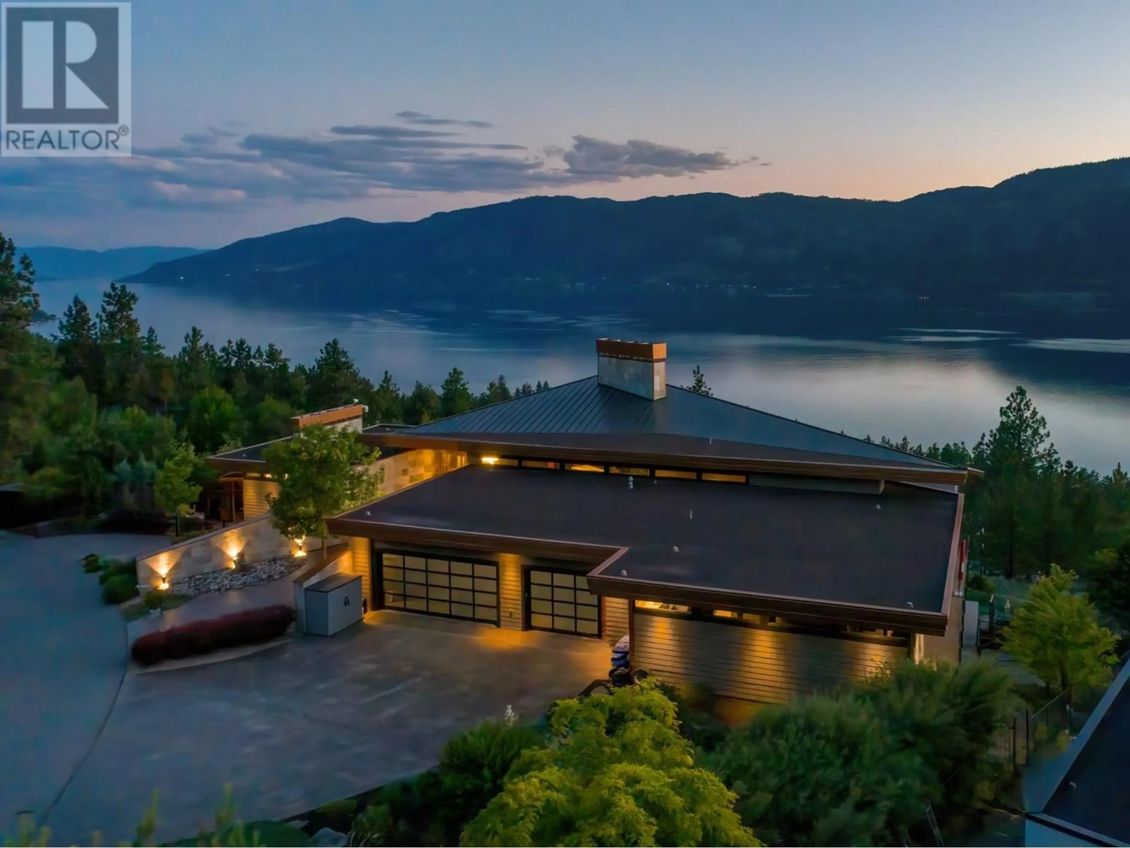 A pic from outside/outdoor area/front of a property/back of a property/a pic from drone, water/lake/river/ocean view for 13889 OGILVEY LANE, Lake Country British Columbia V4V2S8