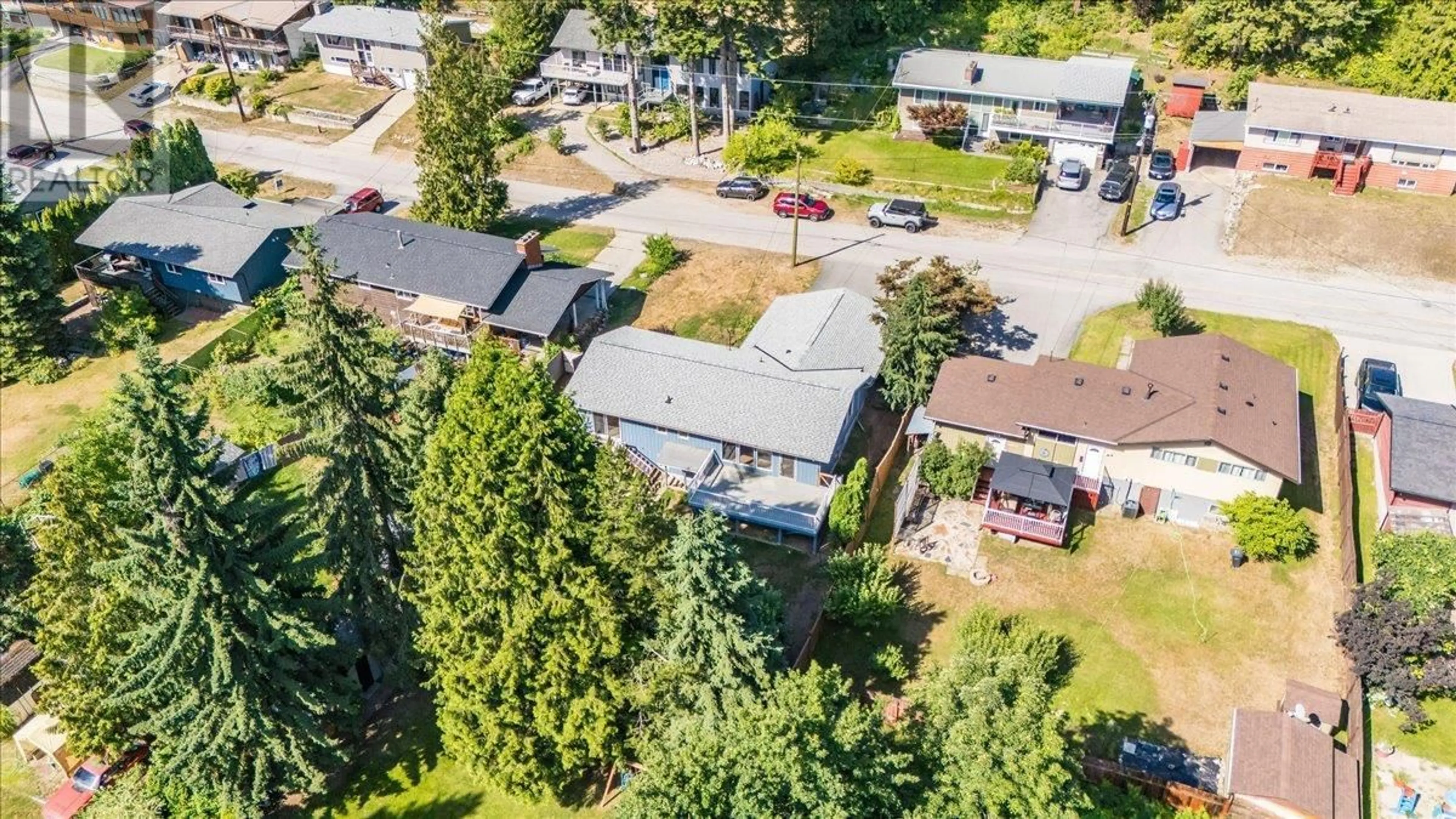 A pic from outside/outdoor area/front of a property/back of a property/a pic from drone, street for 2409 11TH AVENUE, Castlegar British Columbia V1N3B1