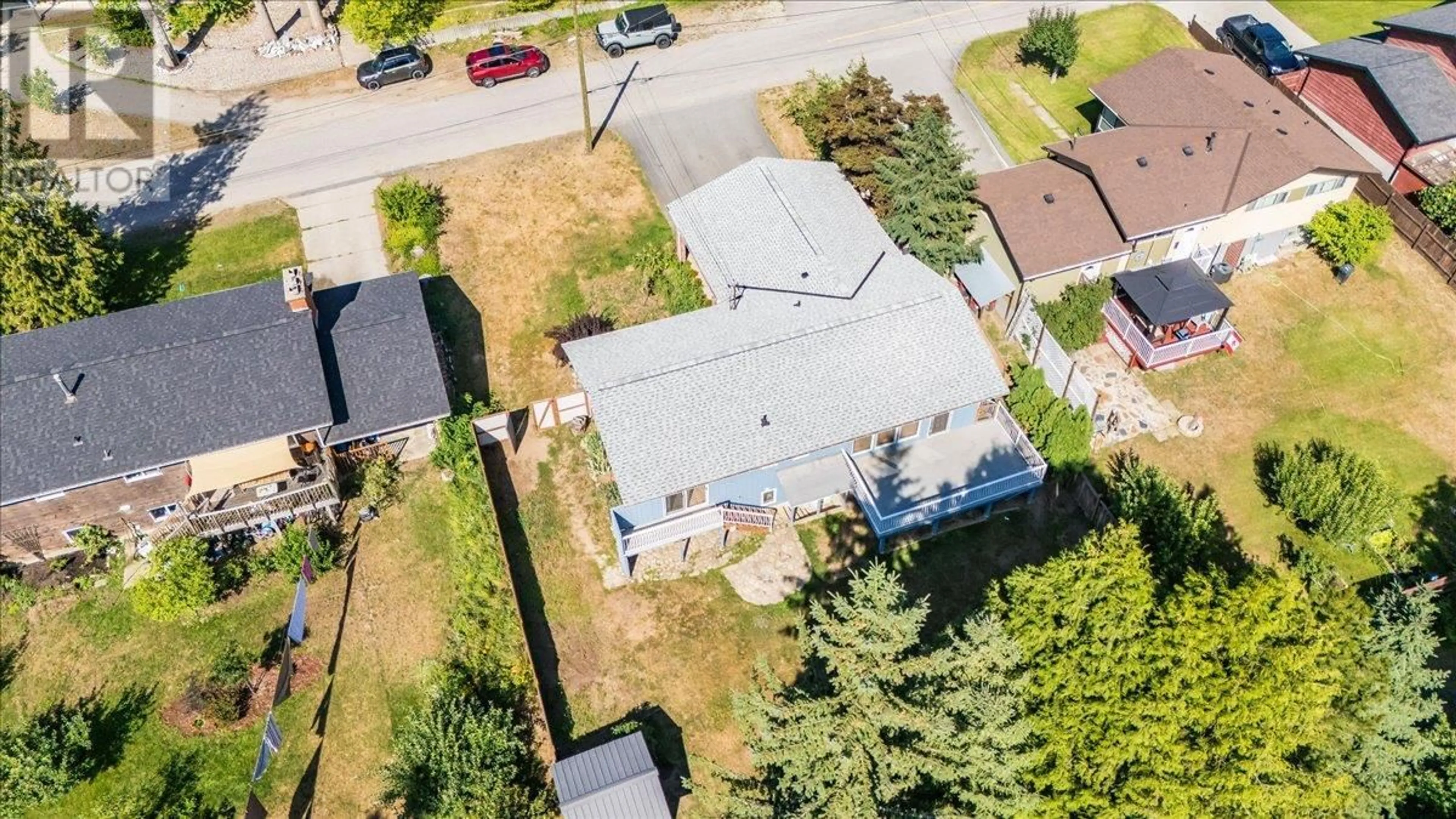 A pic from outside/outdoor area/front of a property/back of a property/a pic from drone, street for 2409 11TH AVENUE, Castlegar British Columbia V1N3B1