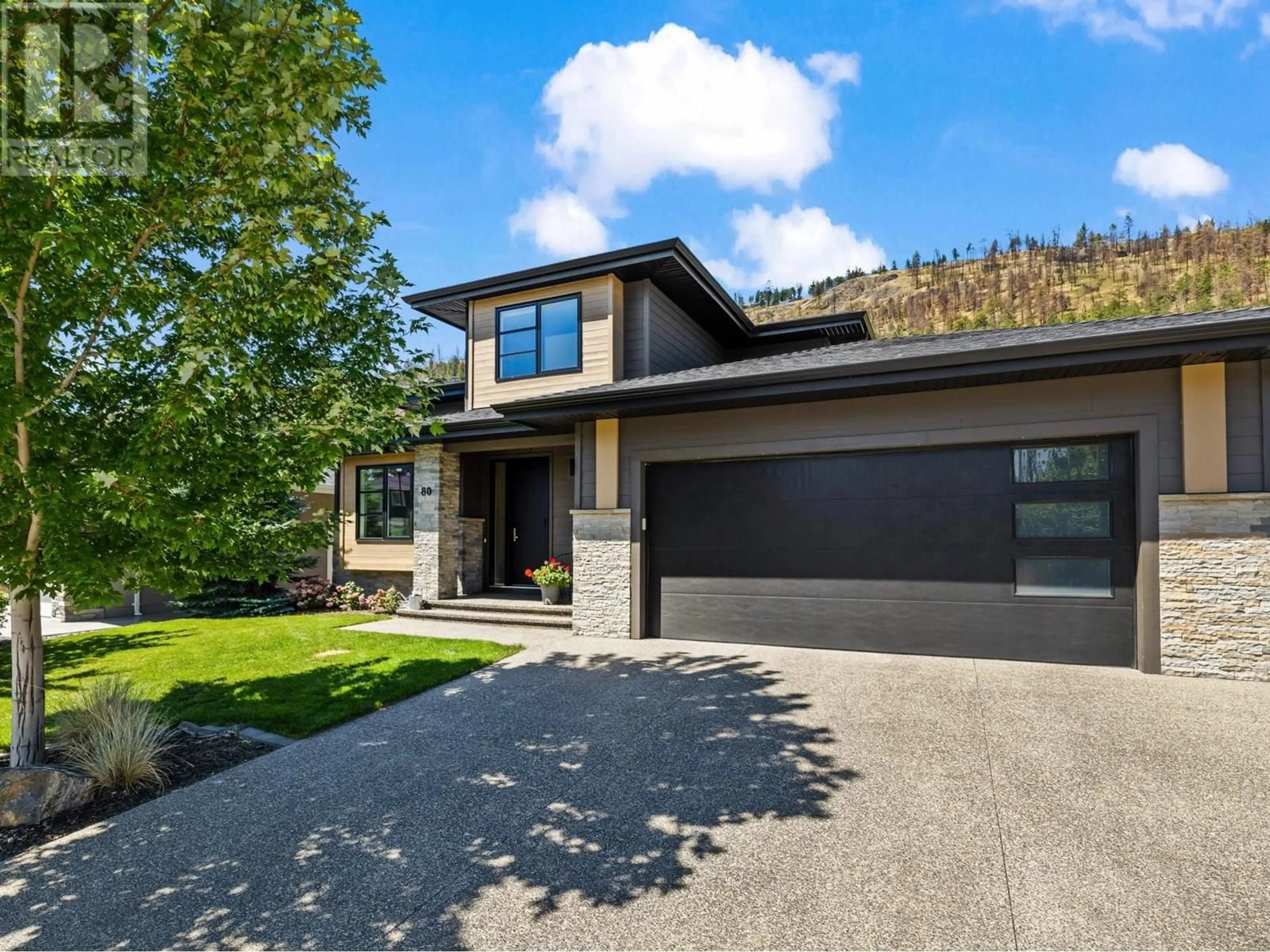 Home with brick exterior material, street for 80 FOREST EDGE DRIVE, Kelowna British Columbia V1V3G3