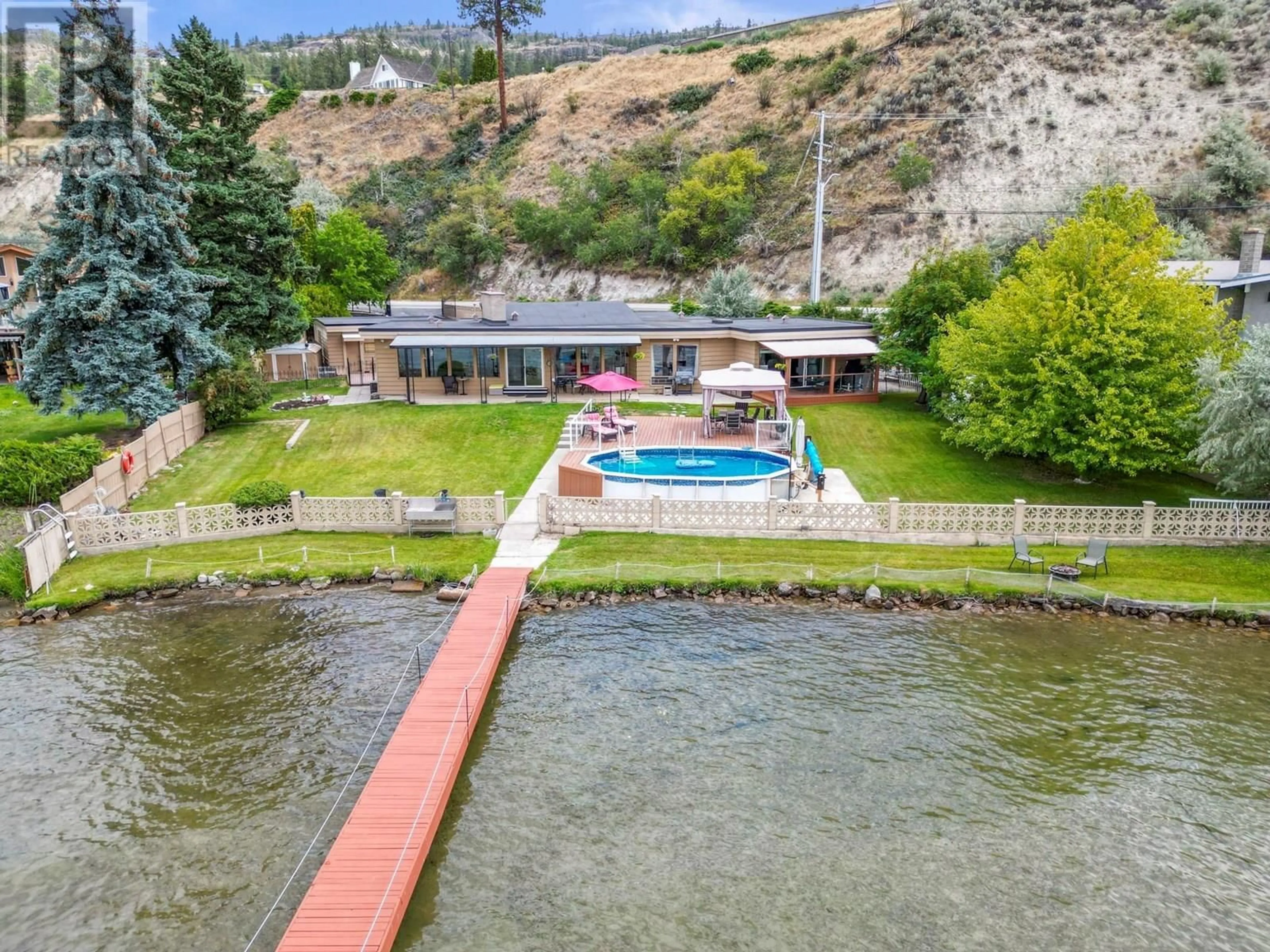 A pic from outside/outdoor area/front of a property/back of a property/a pic from drone, water/lake/river/ocean view for 3939 LAKESIDE ROAD, Penticton British Columbia V2A8W1