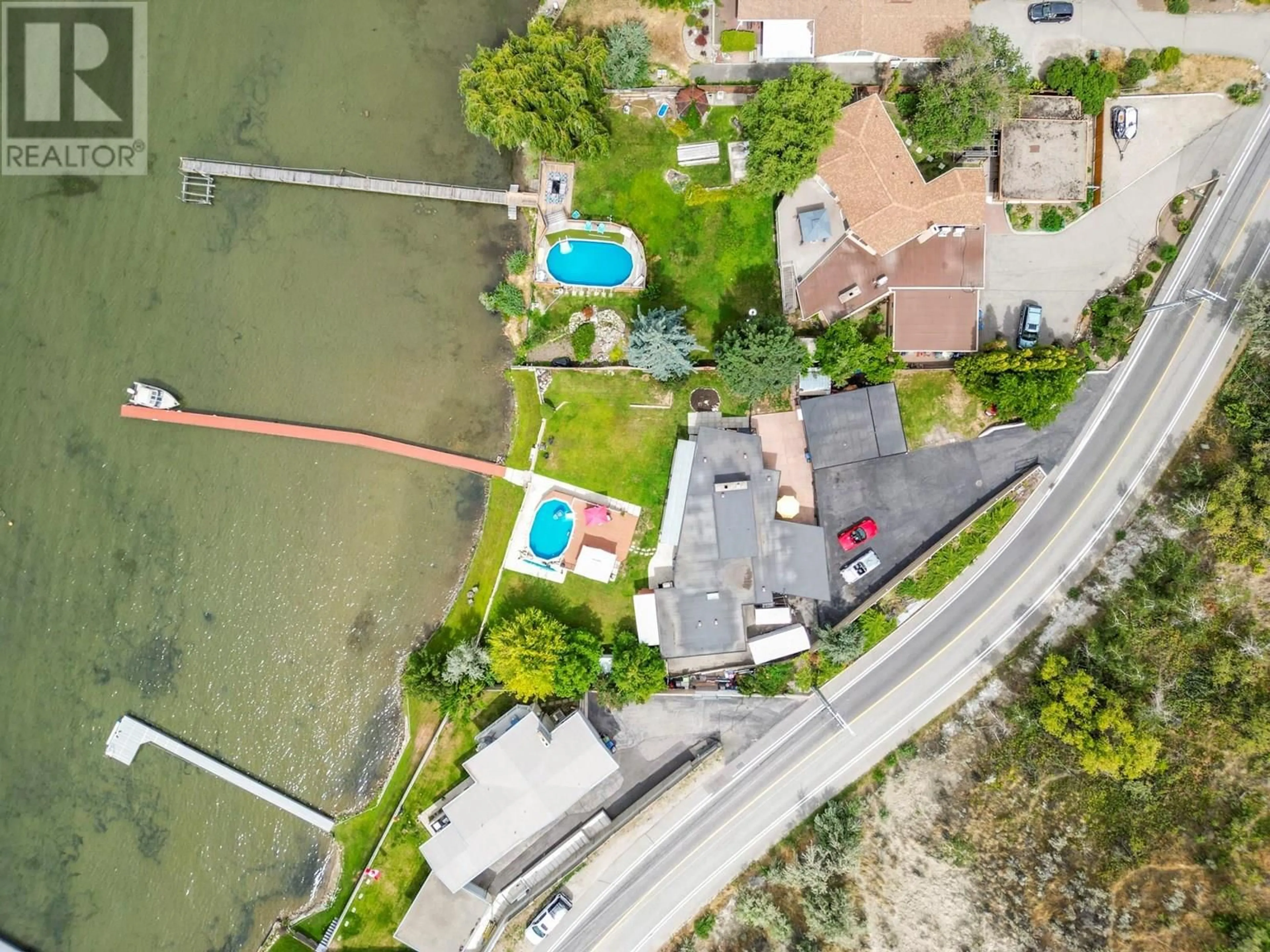 A pic from outside/outdoor area/front of a property/back of a property/a pic from drone, water/lake/river/ocean view for 3939 LAKESIDE ROAD, Penticton British Columbia V2A8W1