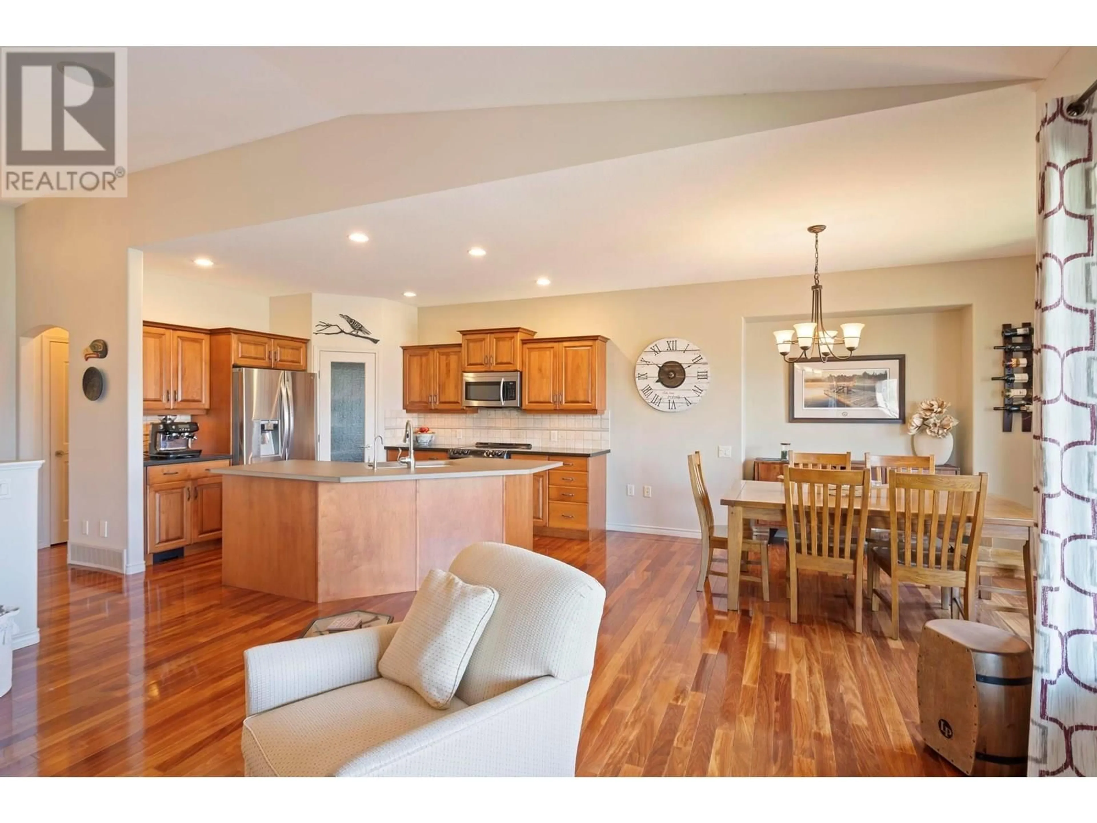 Open concept kitchen, wood/laminate floor for 329 - 663 DENALI COURT, Kelowna British Columbia V1V2R4