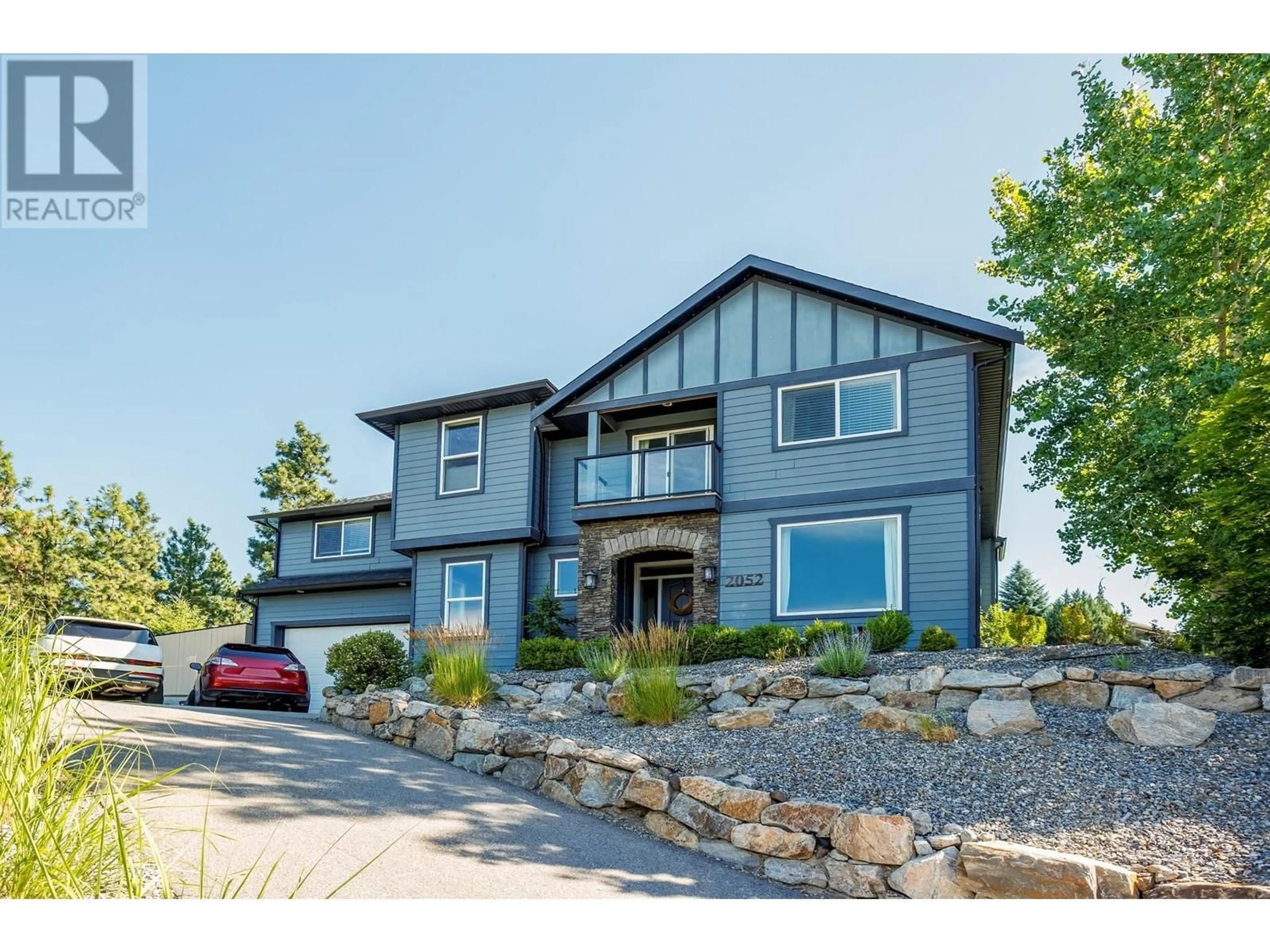 Home with vinyl exterior material, street for 2052 SUNVIEW DRIVE, West Kelowna British Columbia V1Z3X6