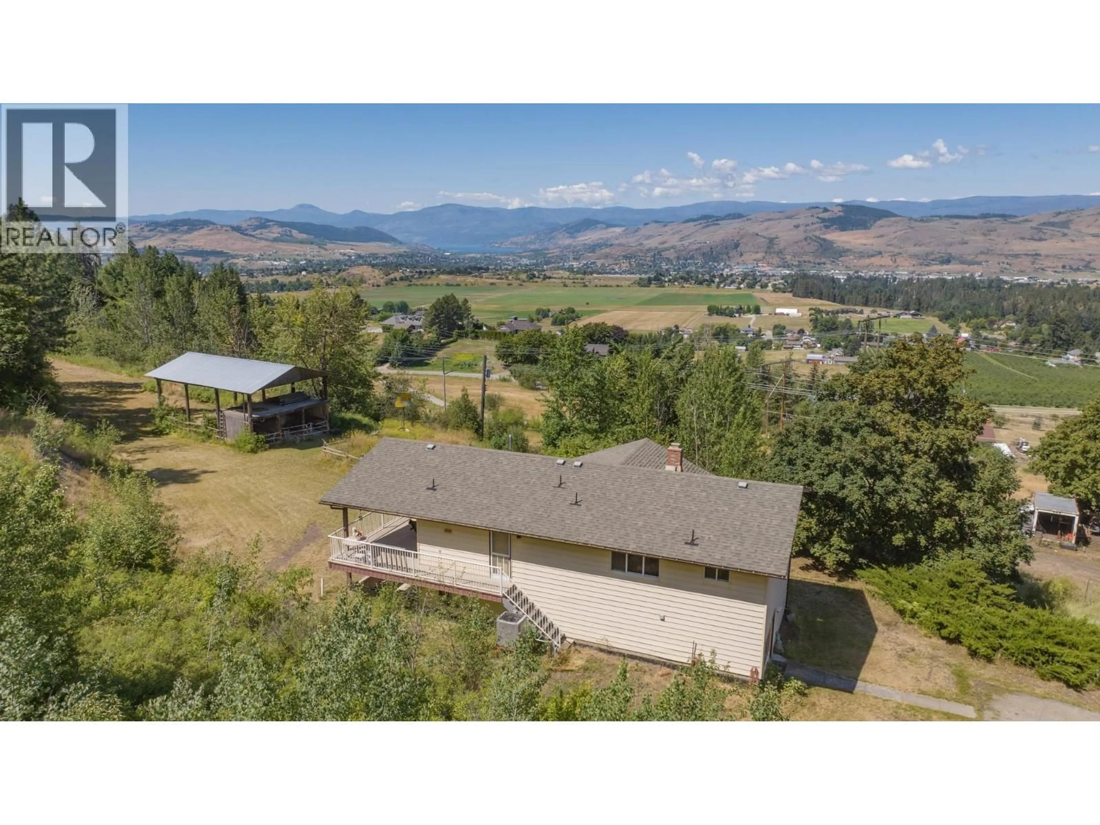 A pic from outside/outdoor area/front of a property/back of a property/a pic from drone, mountain view for 4587 BRIGGS ROAD, Vernon British Columbia V1B3J4