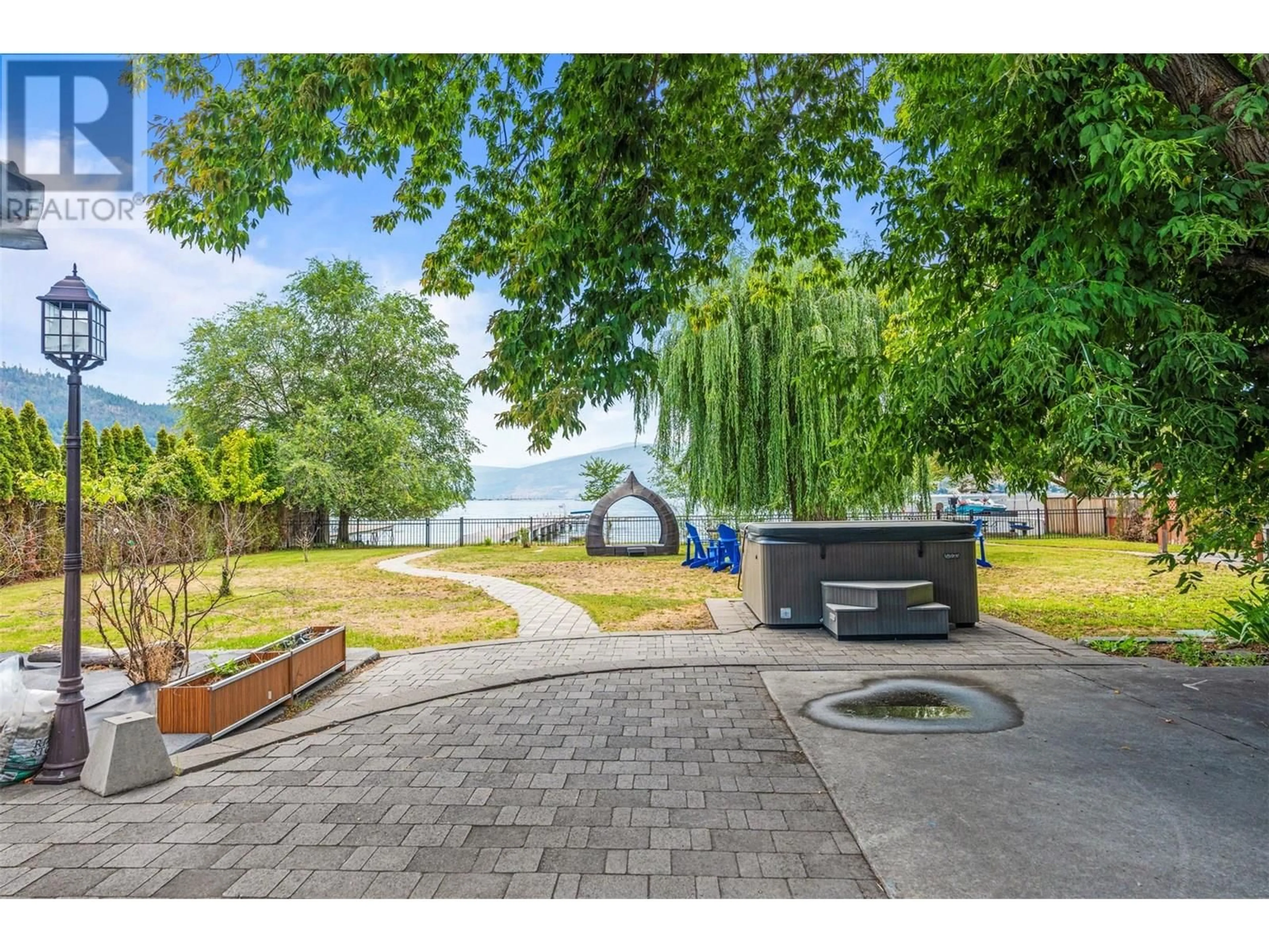 A pic from outside/outdoor area/front of a property/back of a property/a pic from drone, water/lake/river/ocean view for 2640 LAKESHORE ROAD, Vernon British Columbia V1H1N1