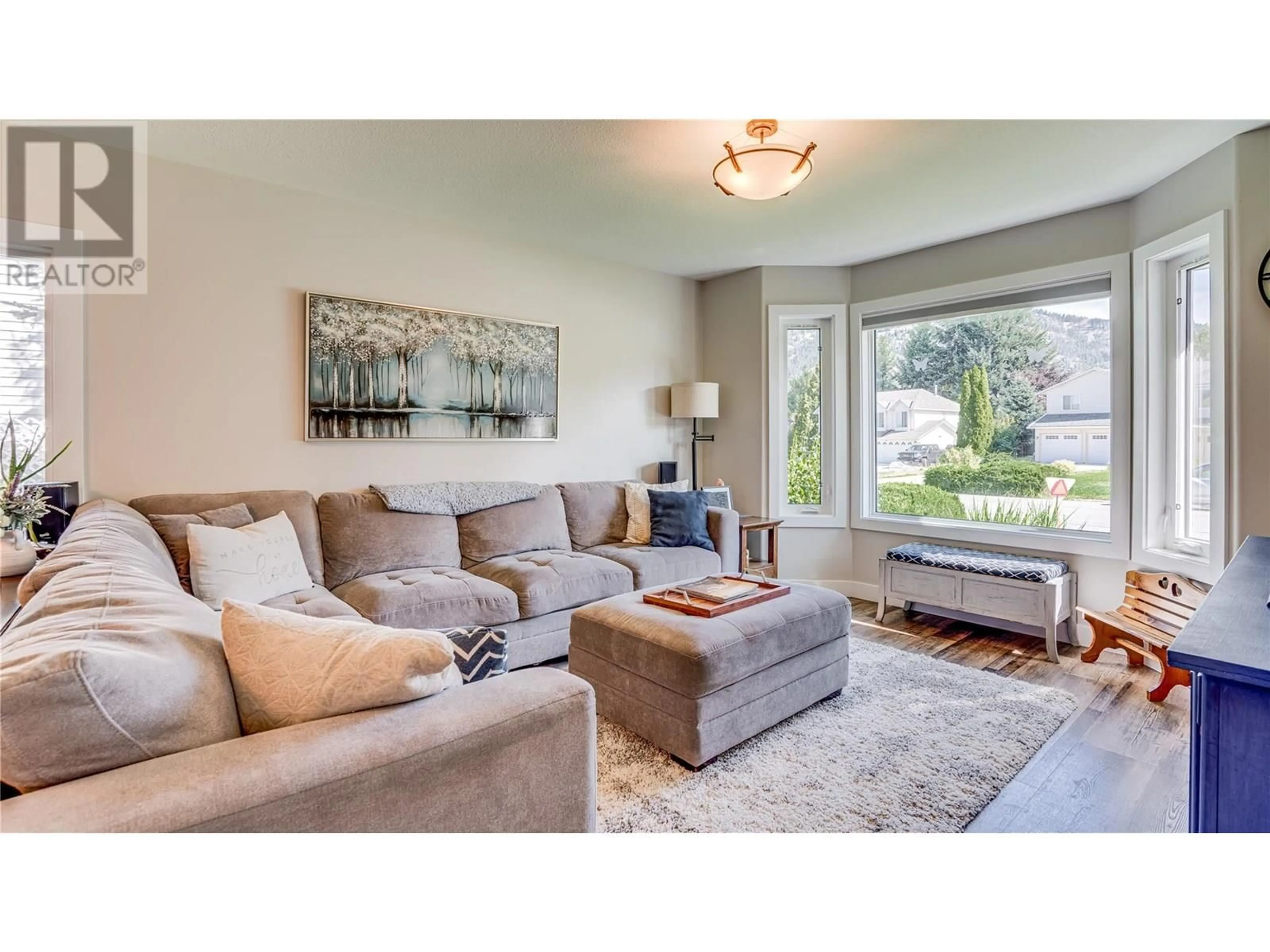 Living room with furniture, unknown for 6440 WOODLAND DRIVE, Coldstream British Columbia V1B3G7