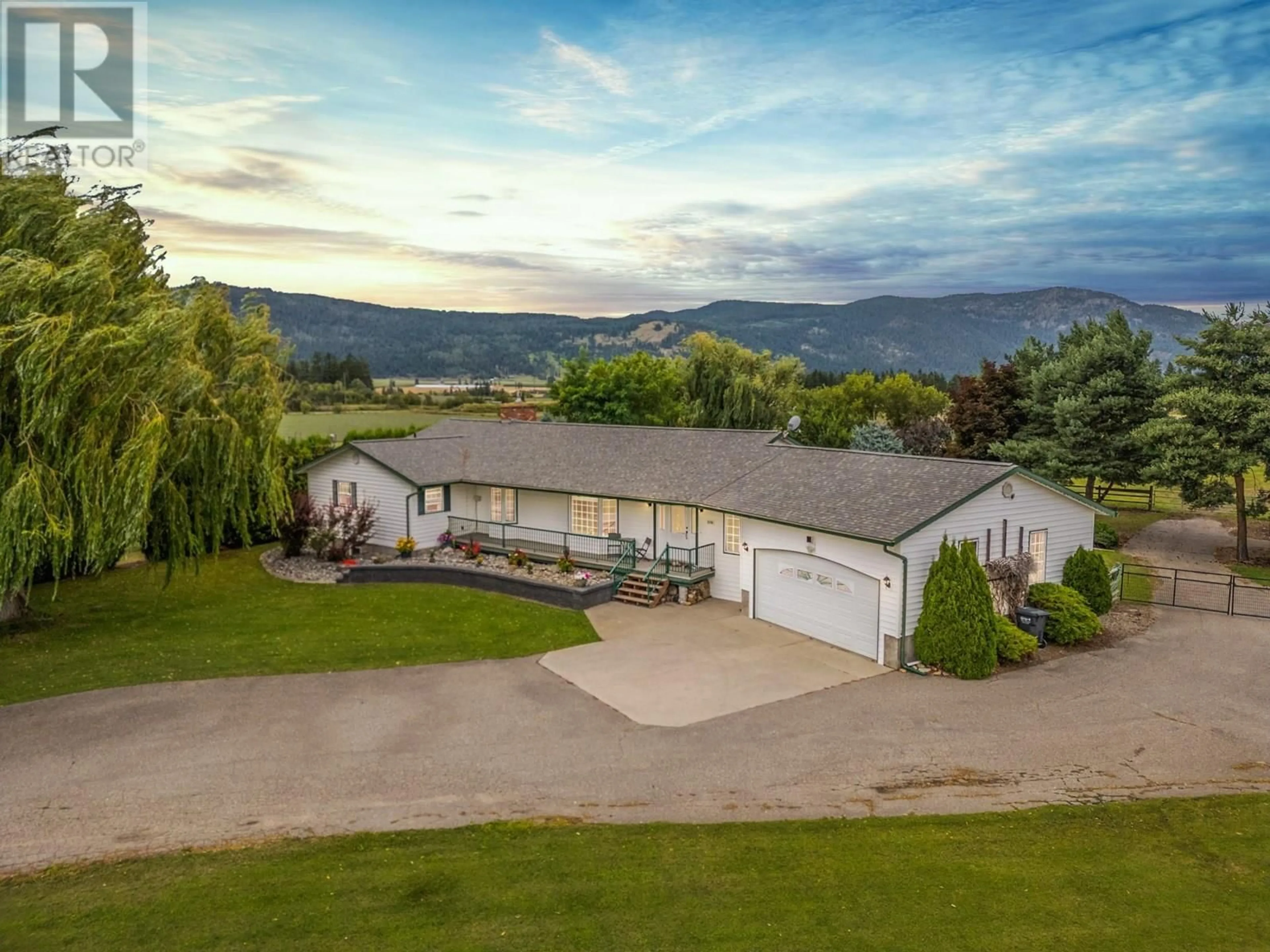 A pic from outside/outdoor area/front of a property/back of a property/a pic from drone, mountain view for 1176 THOMAS HAYES ROAD, Armstrong British Columbia V0E1B6