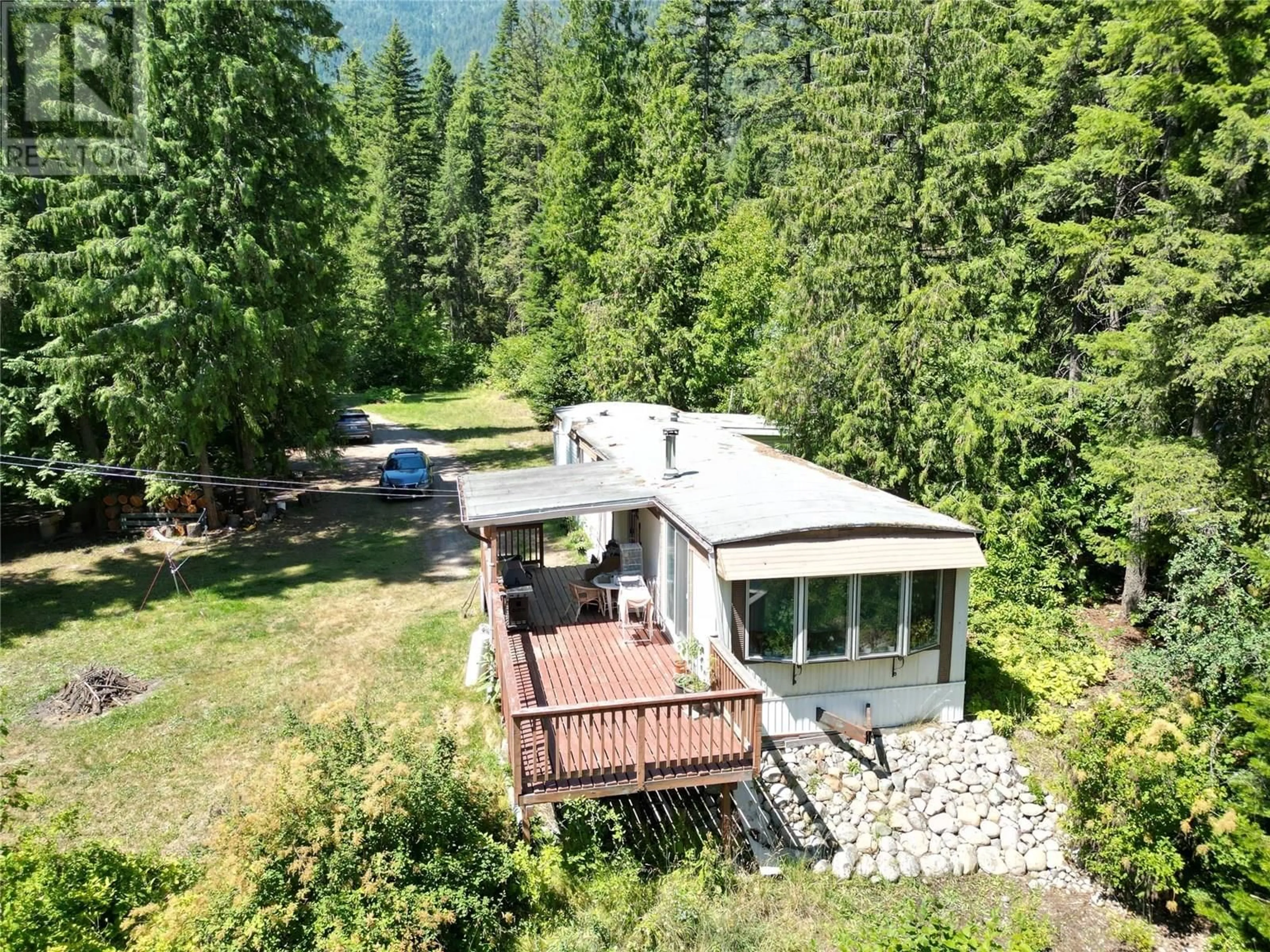 A pic from outside/outdoor area/front of a property/back of a property/a pic from drone, forest/trees view for 2048 HIGHWAY 3A OTHER, Tarrys British Columbia V1N4N1