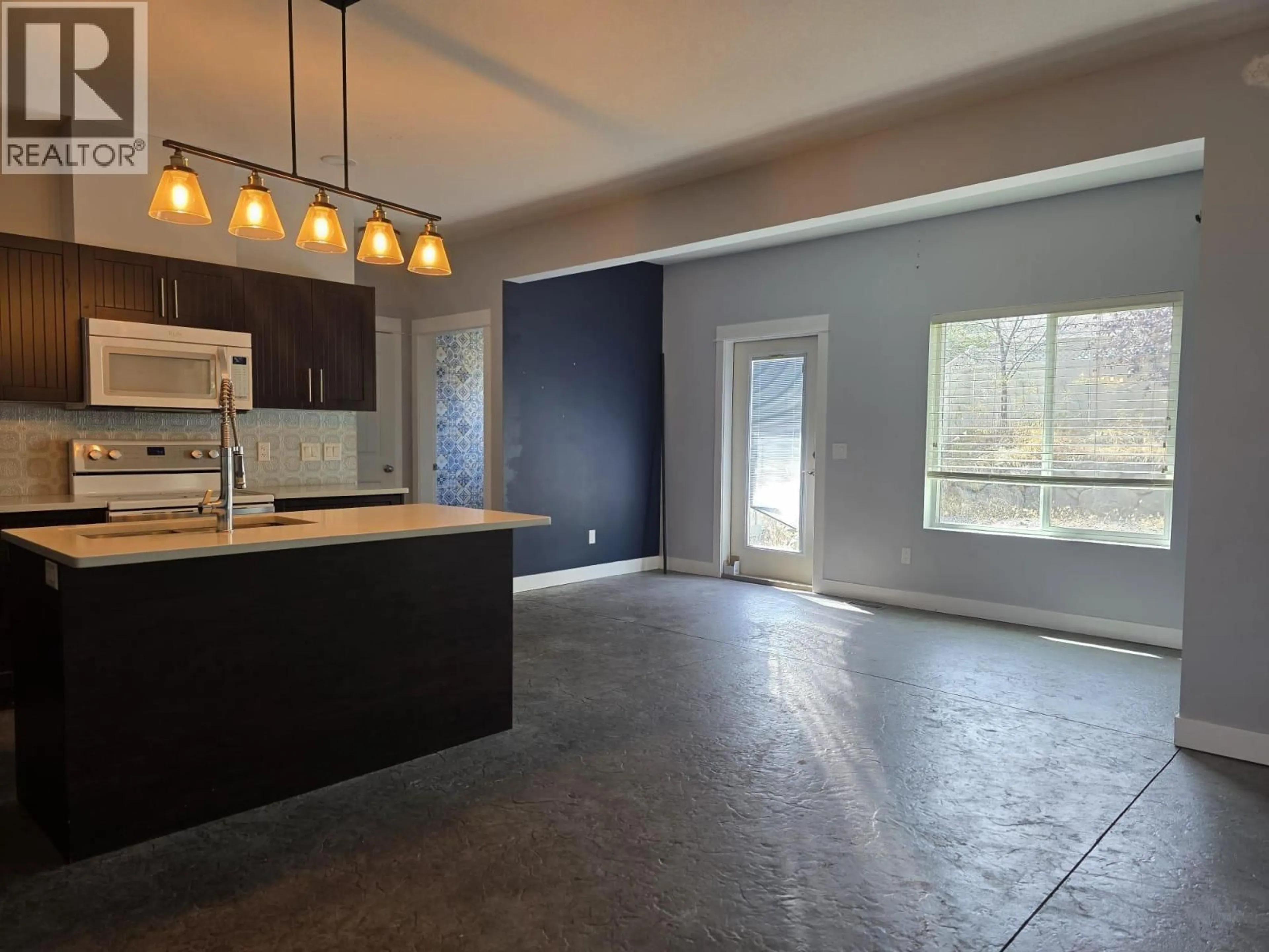 Open concept kitchen, cement floor for 2043 ELKRIDGE DRIVE, West Kelowna British Columbia V4T3K1