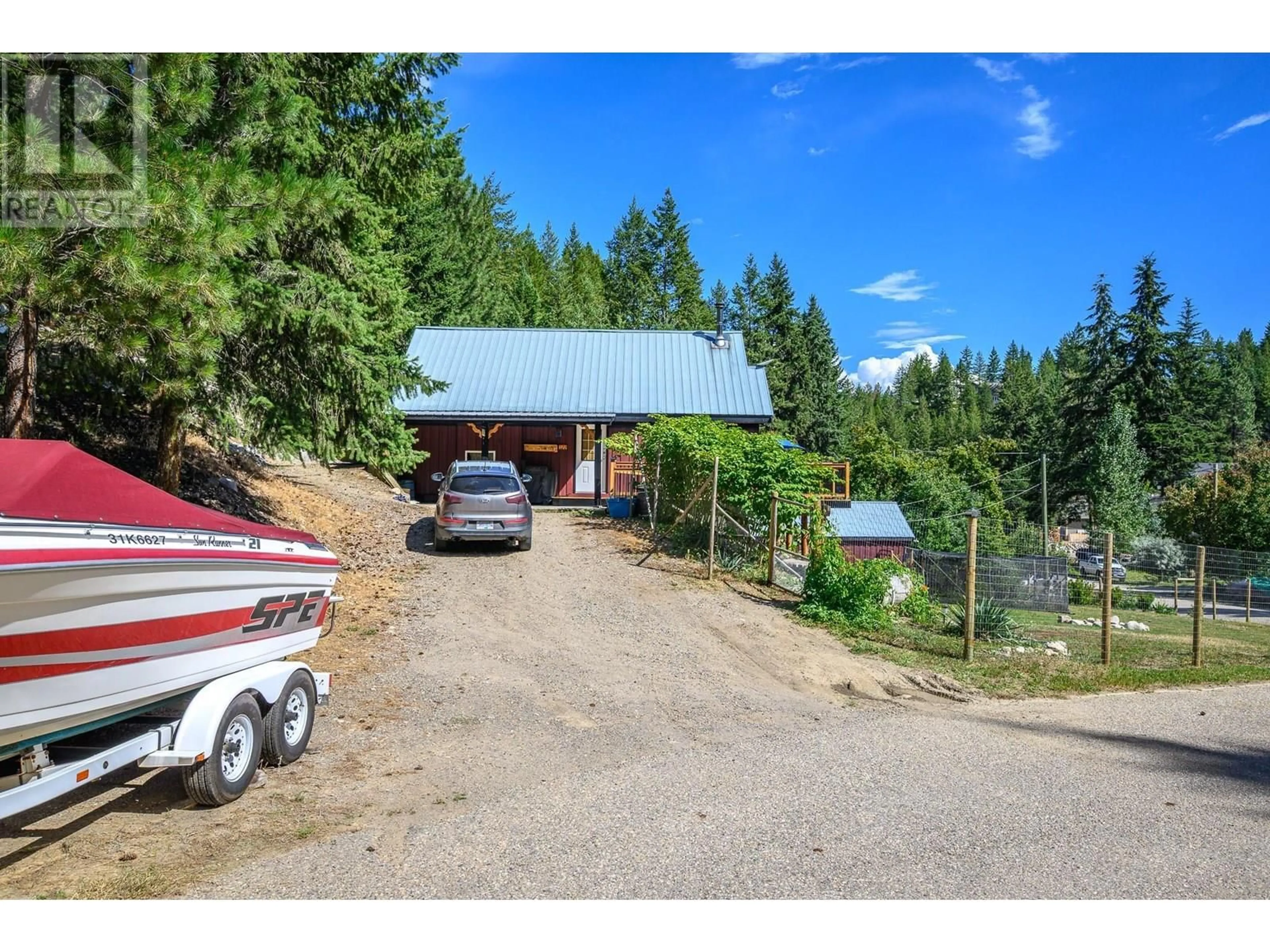 A pic from outside/outdoor area/front of a property/back of a property/a pic from drone, mountain view for 322 NORTHERN VIEW DRIVE, Vernon British Columbia V1H2C3
