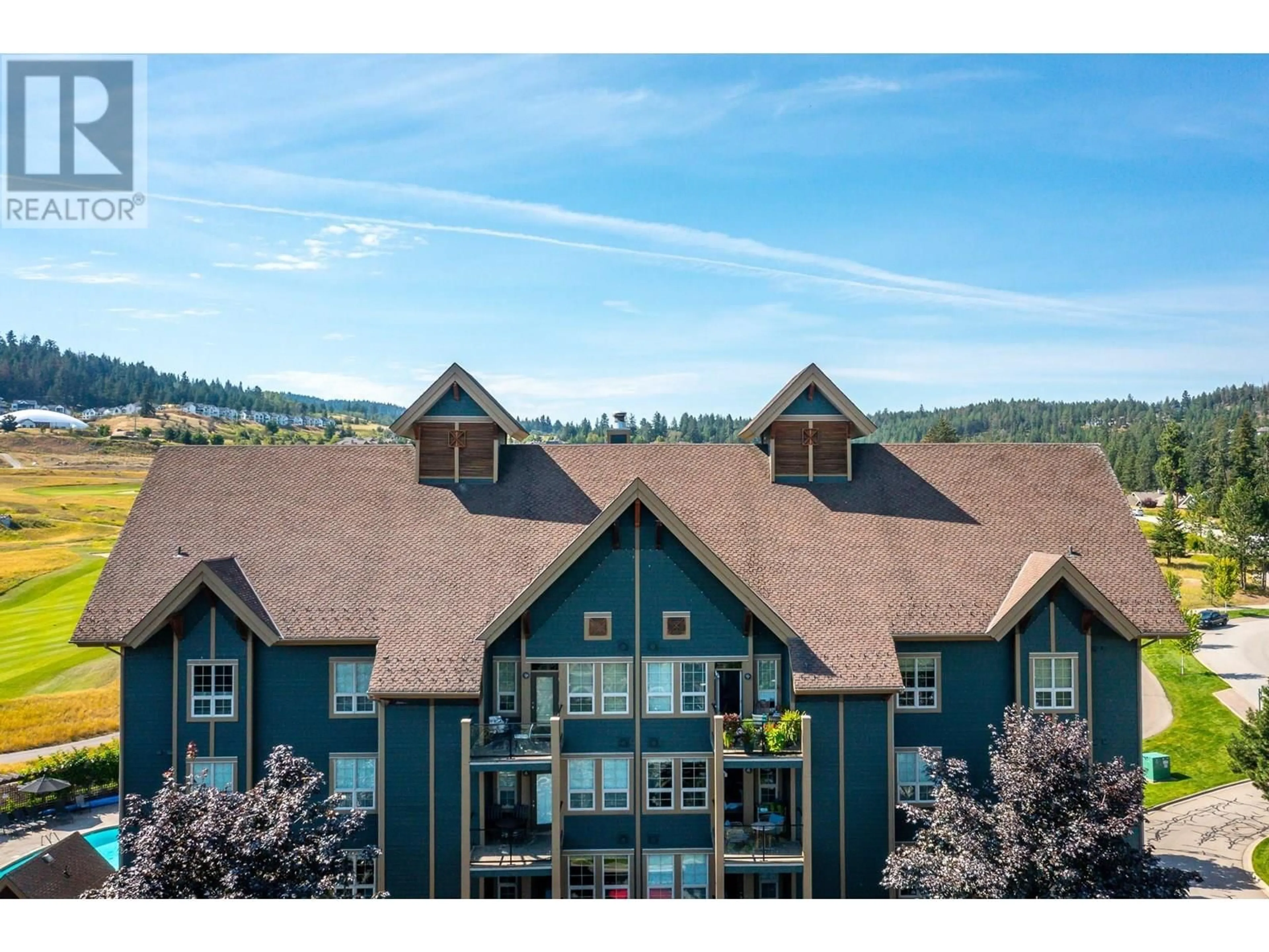 A pic from outside/outdoor area/front of a property/back of a property/a pic from drone, mountain view for 431 - 101 VILLAGE CENTRE COURT, Vernon British Columbia V1H1V8