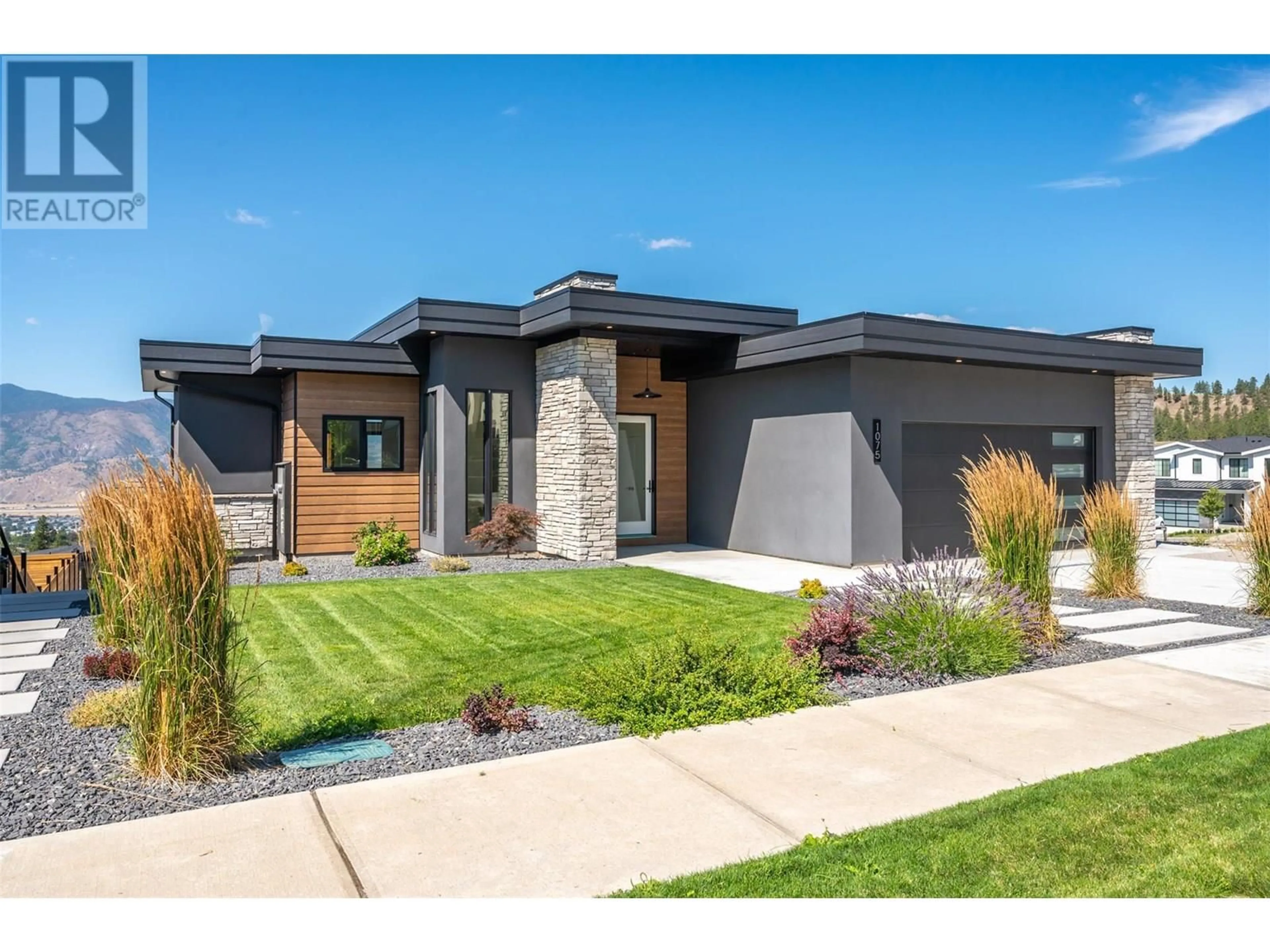 Home with brick exterior material, street for 1075 ELK STREET, Penticton British Columbia V2A0C9