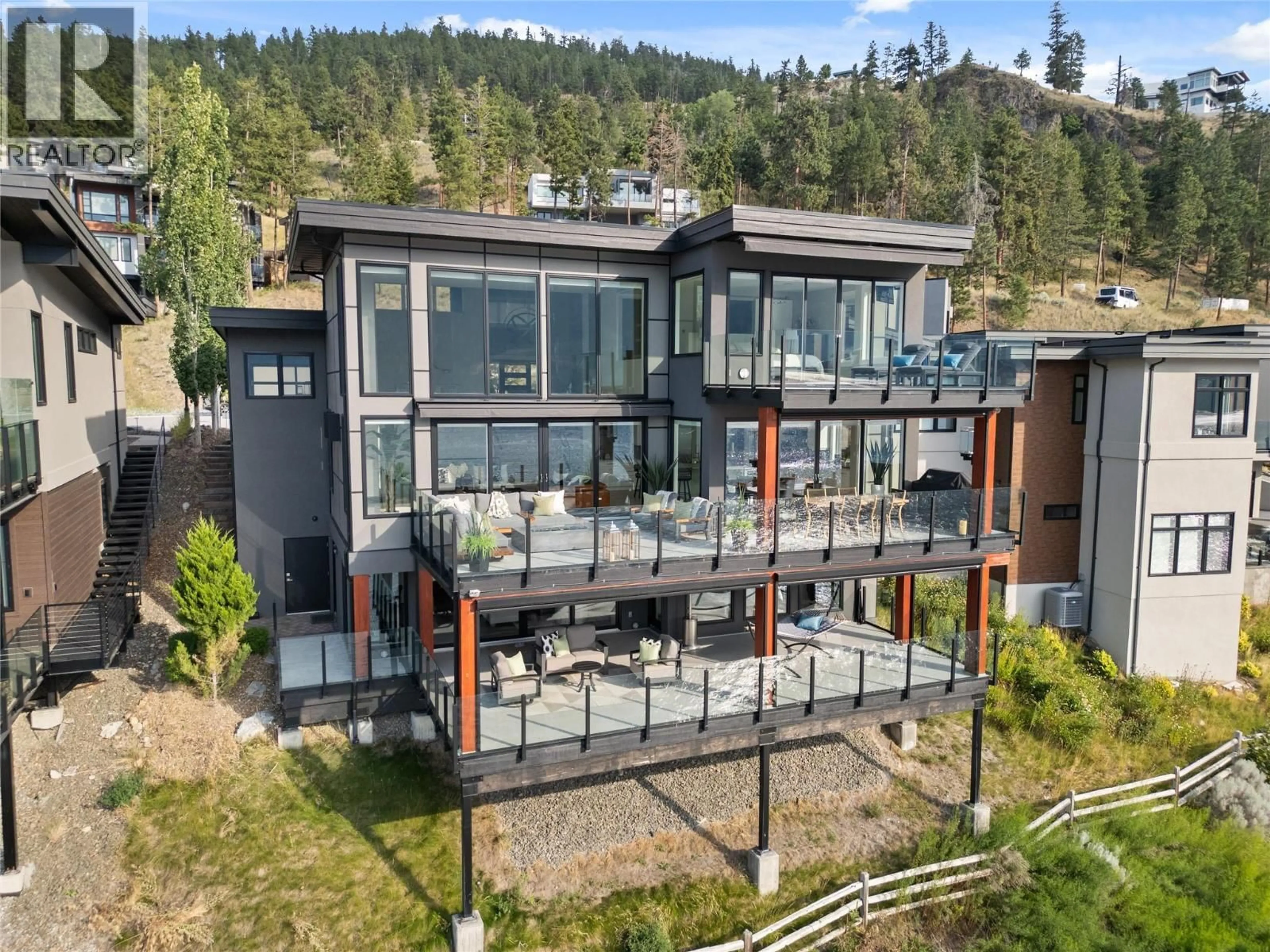 A pic from outside/outdoor area/front of a property/back of a property/a pic from drone, mountain view for 3322 MCKINLEY BEACH DRIVE, Kelowna British Columbia V1V3G1
