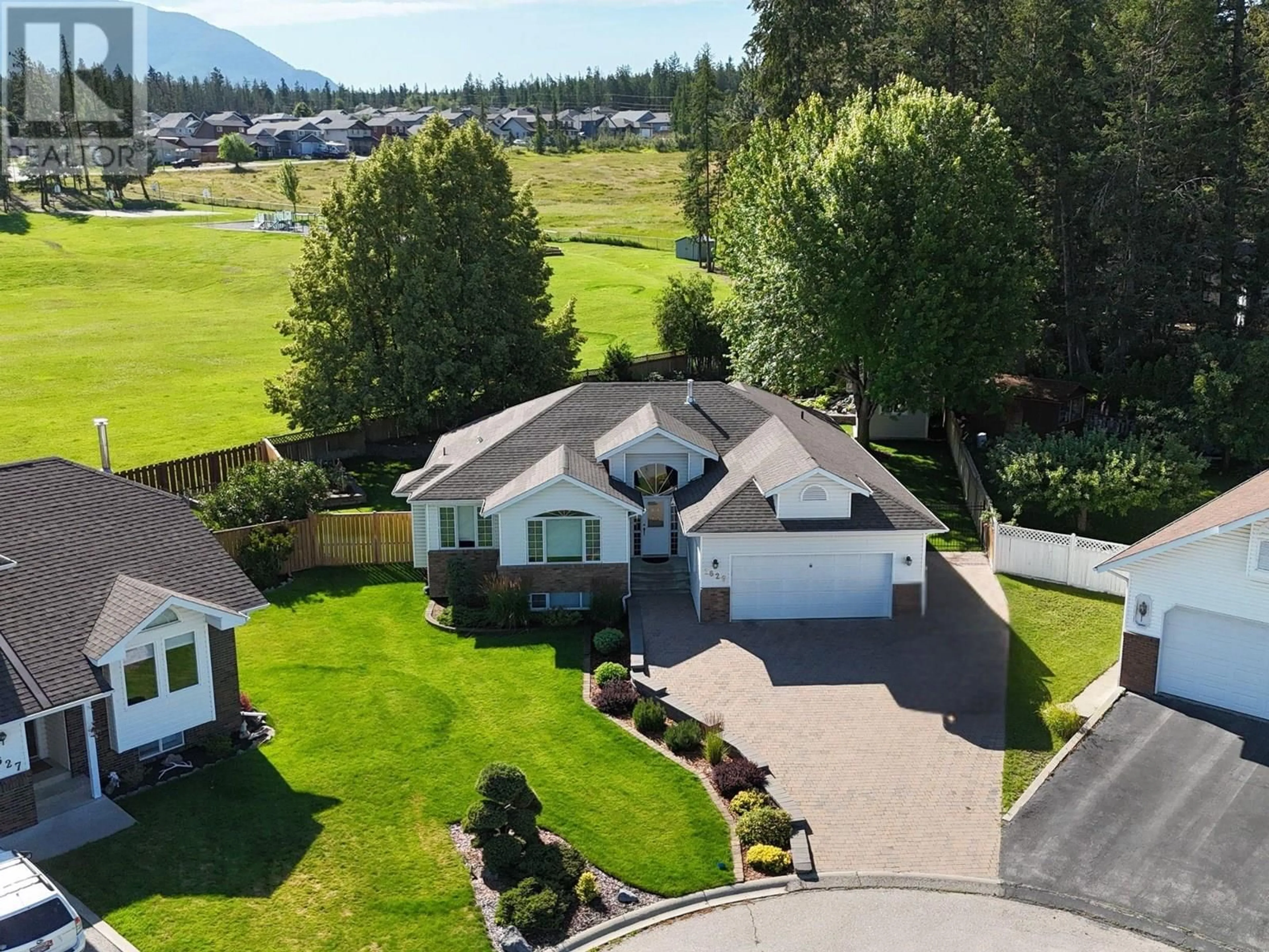A pic from outside/outdoor area/front of a property/back of a property/a pic from drone, mountain view for 1629 STAPLE CRESCENT, Cranbrook British Columbia V1C6J1