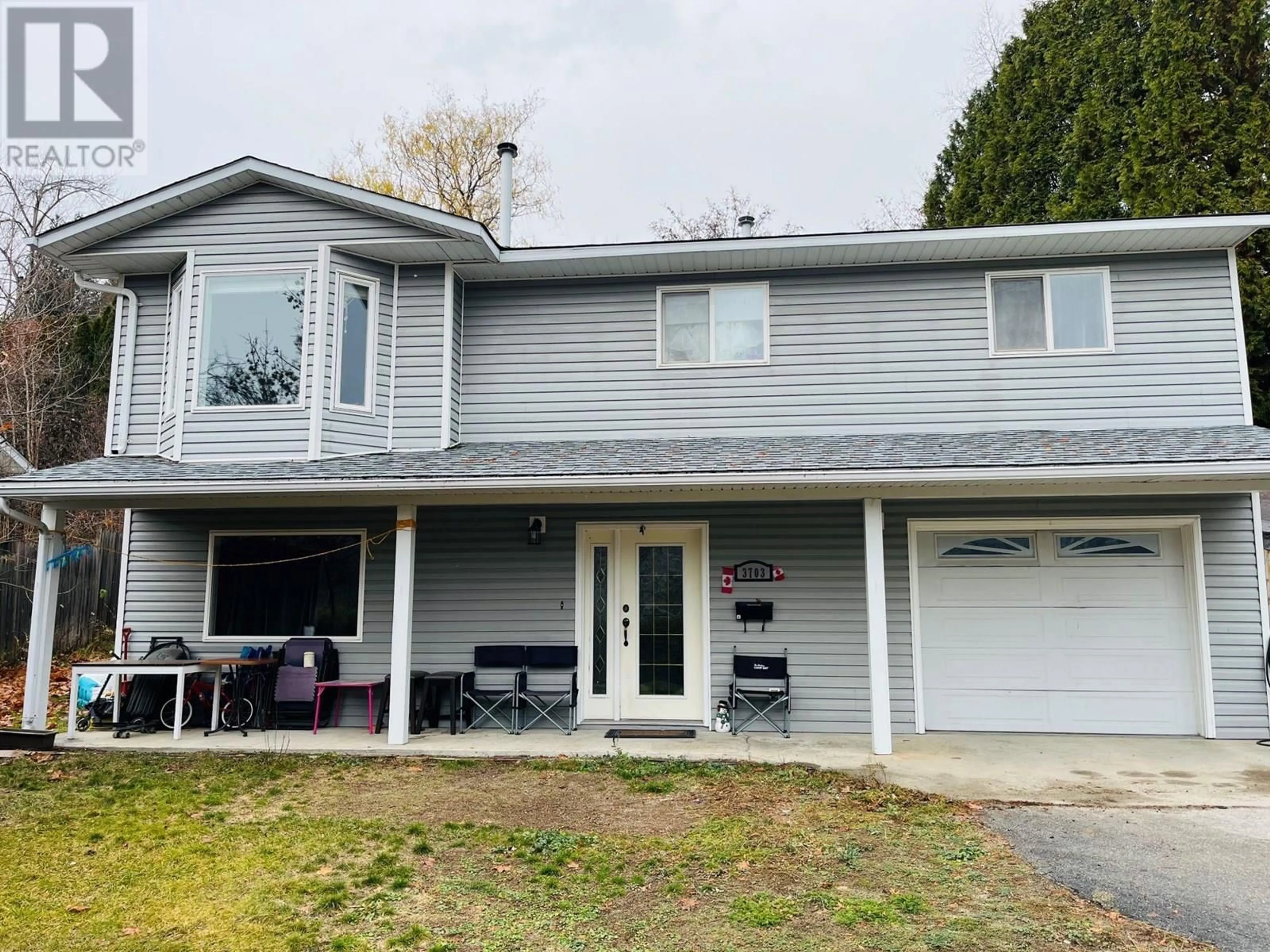 Home with vinyl exterior material, street for 3703 9TH AVENUE, Castlegar British Columbia N1N3T3